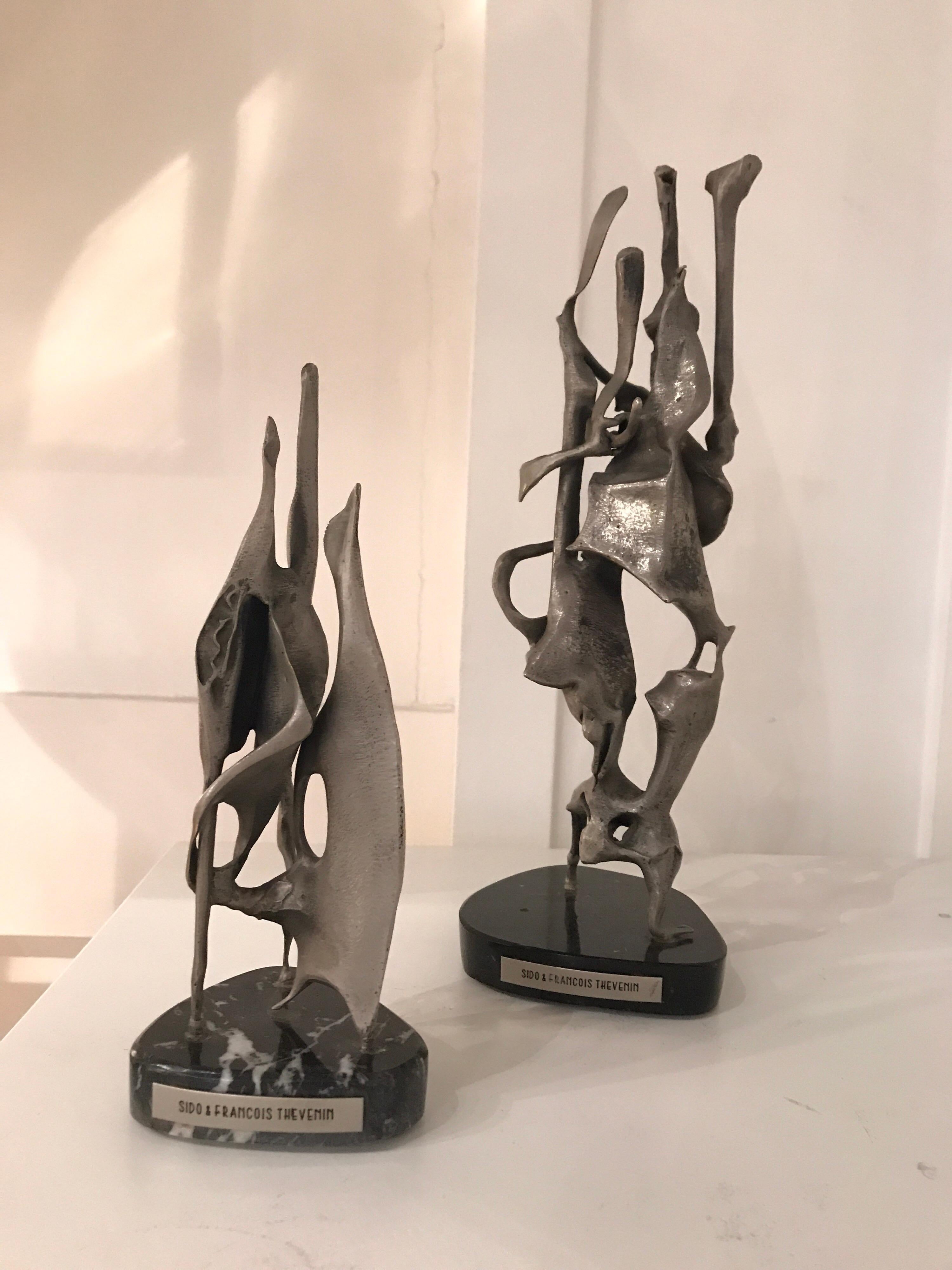 Sido and Francois Thevenin metal abstract sculptures, 1972, France
Hand signed 1972
Mounted on marble bases
Small: 23 cm height 10 cm diameter.