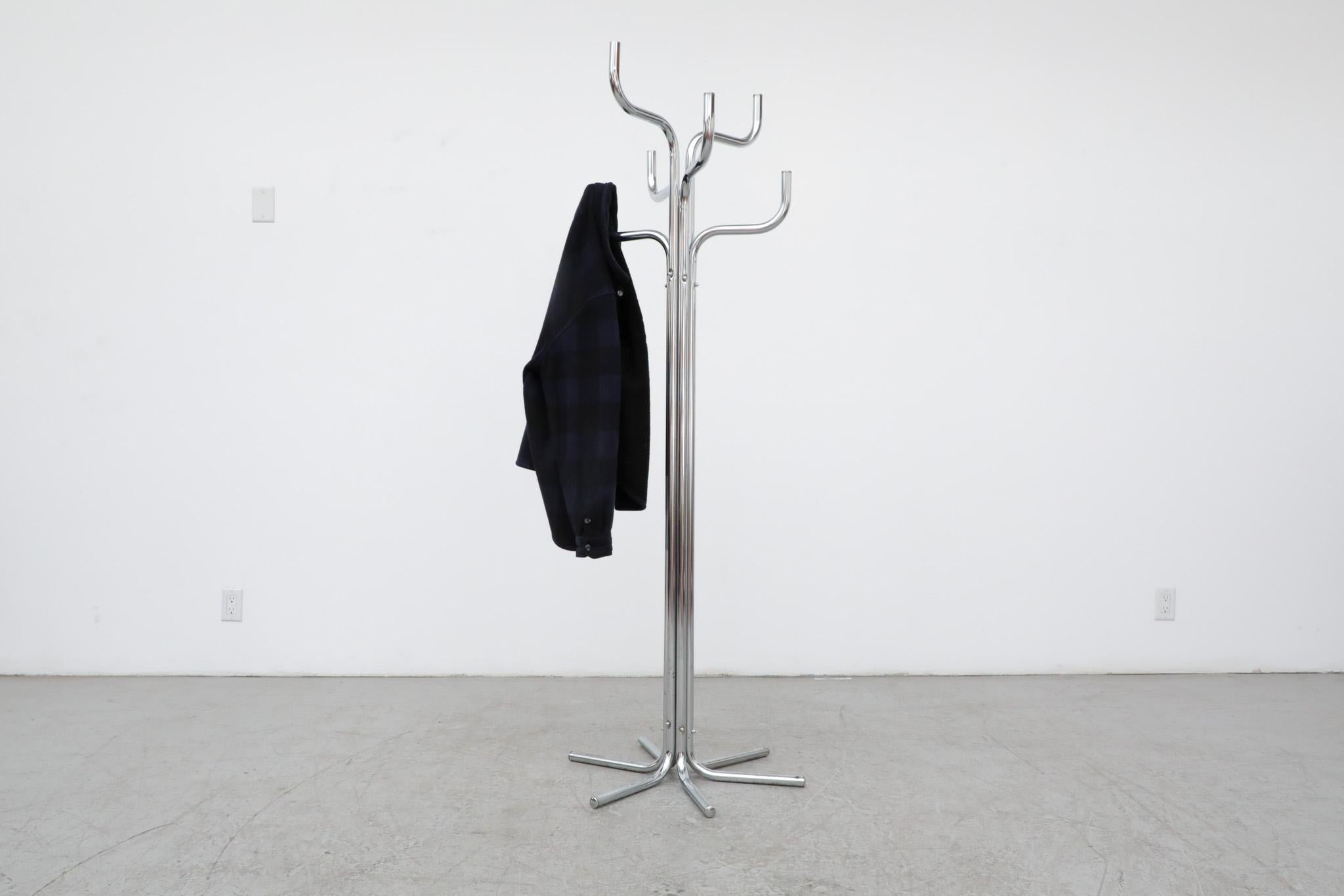 Gorgeous, Mid-Century, 1970's, Sidse Werner style chrome tube 'coat tree' coat rack. Dynamic design and practical functionality highlighted by 8 bent steel tubes. Piece is in original condition with some visible wear and patina. all consistent with