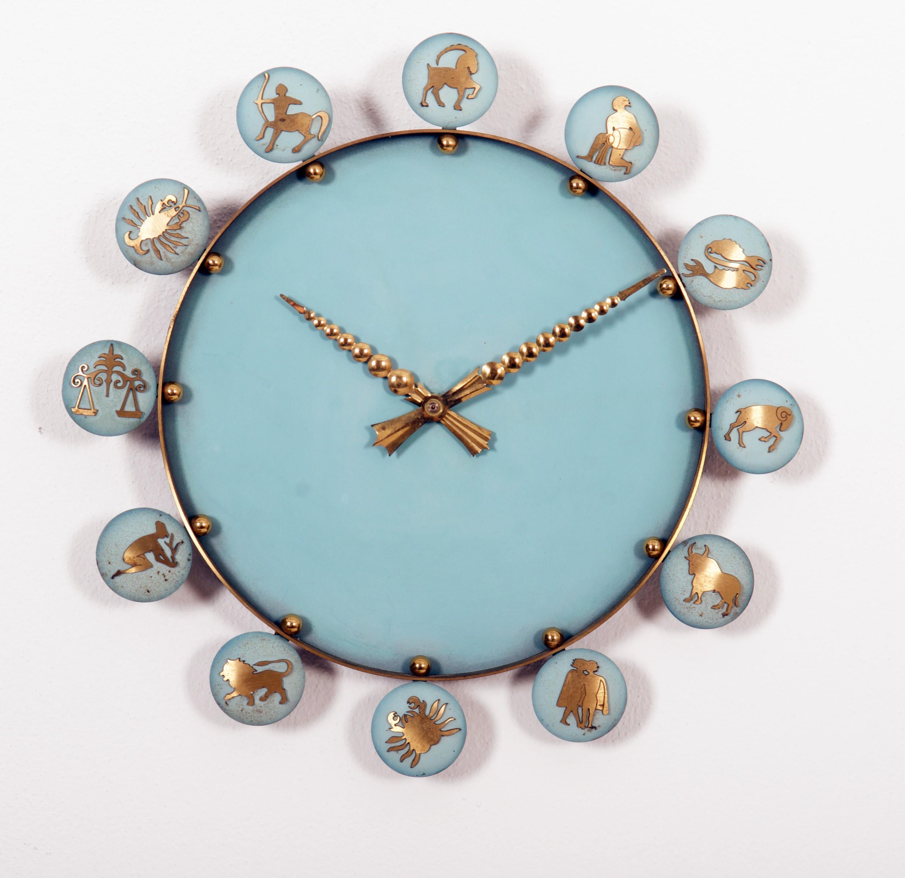 Brass painted with brass zodiac sing. Manufactured by Siemens in Germany in the 1970s. 
Formerly a slave clock, it is now fitted with a modern quartz movement with a battery. (see the last pictures).