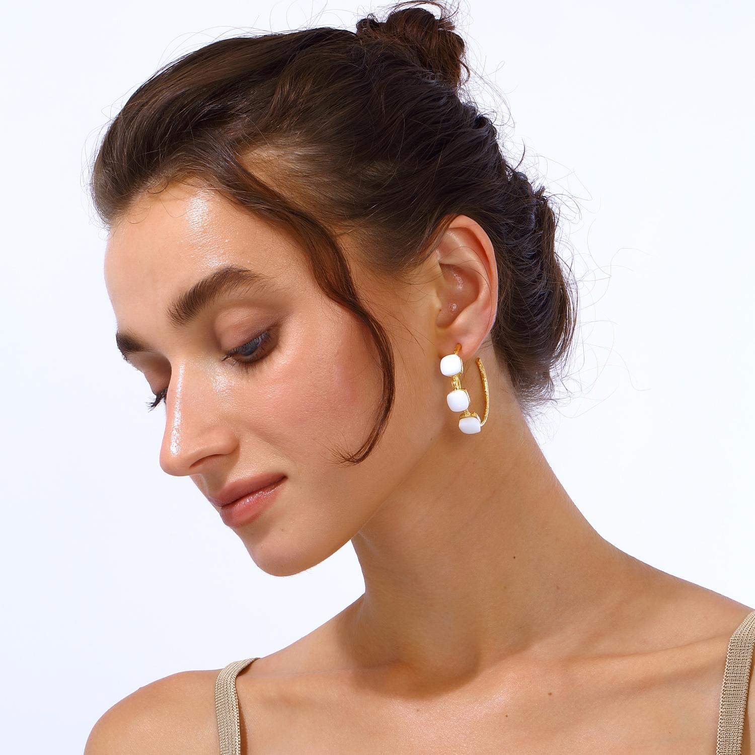 Timeless Elegance: The Siena Hoop Earrings showcase a refined design featuring cushion-cut natural stones, offering a perfect balance of sophistication and modernity. Their radiant sparkle makes them a versatile statement piece for any