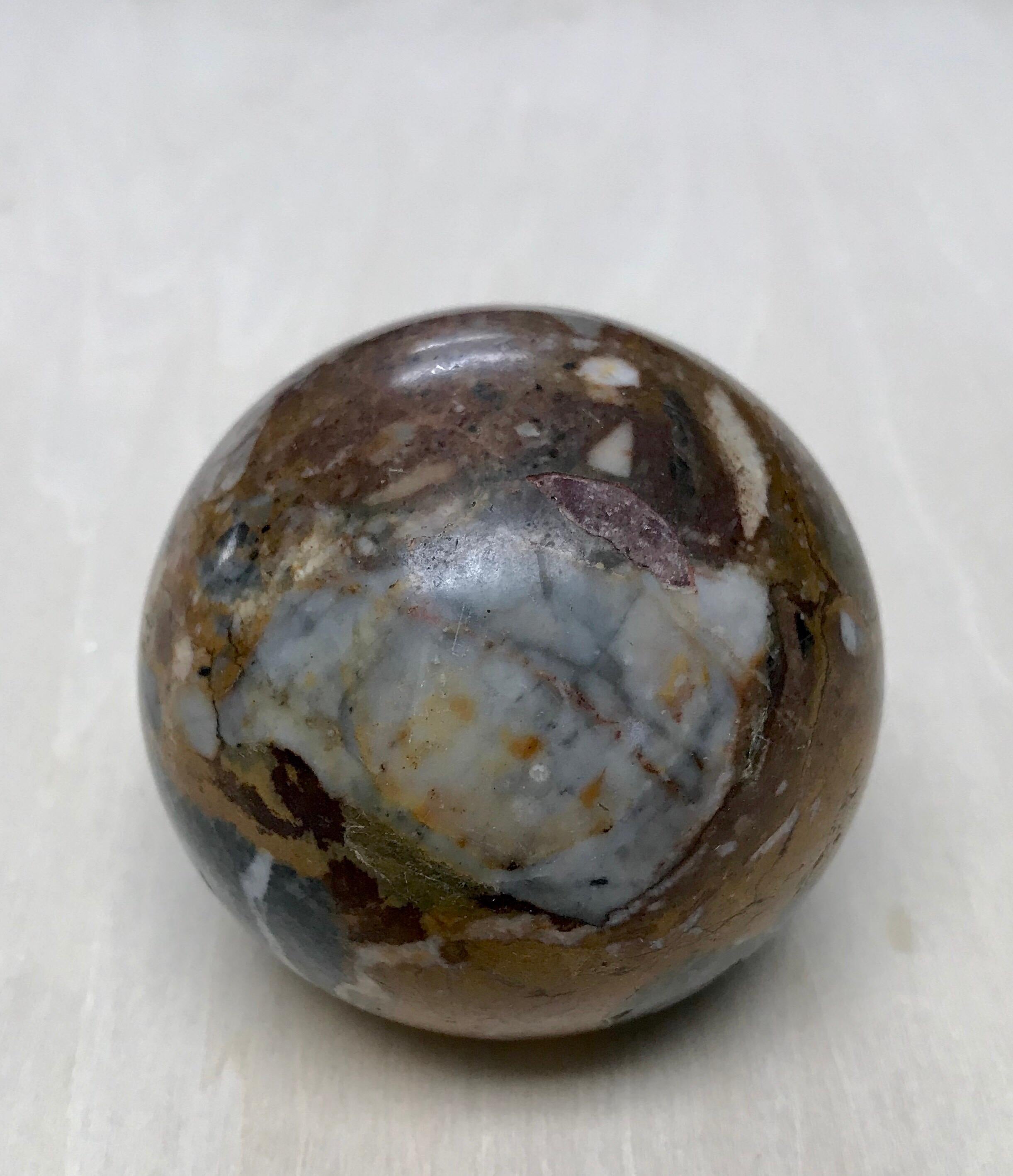 Handsome and petite sienna marble paperweight desk accessory. Early 20th century old world style in the grand tour taste.
 