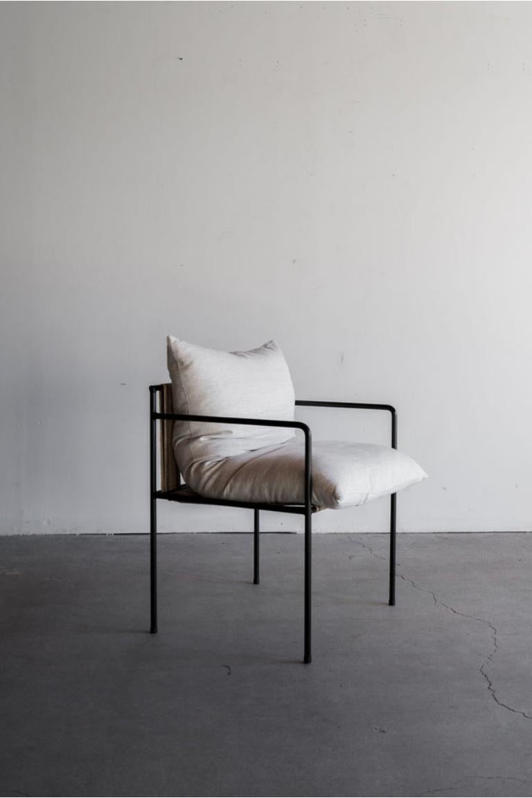 The Sierra Dining Chair is custom made to order in Los Angeles, California. The steel is cut, bent, welded, and finished matte black. The upholstery is cut and sewn to order. 

INDUSTRIAL STEEL + DOWN + COTTON BLEND
POLY FINISH
CUSTOMIZE THIS