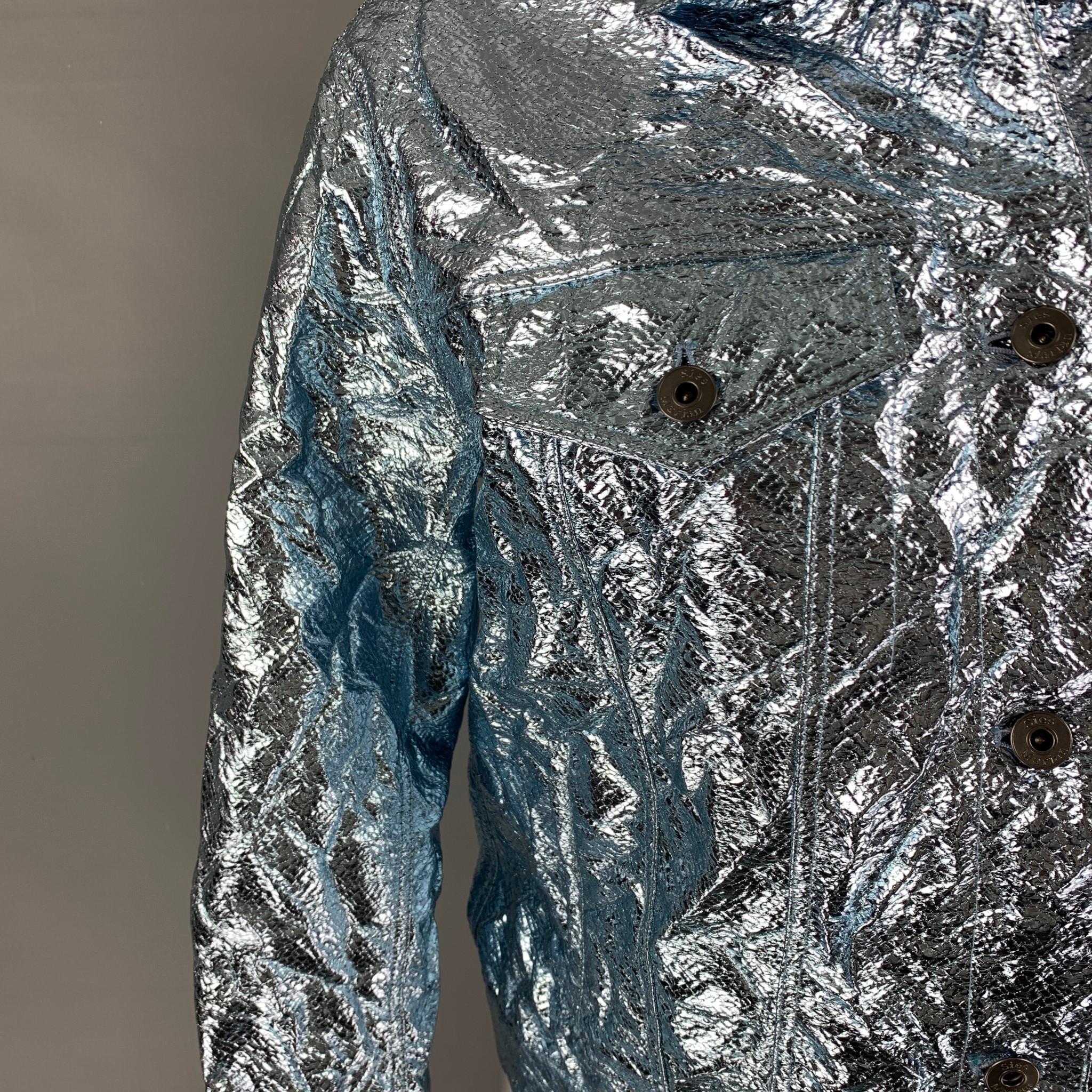 SIES MARJAN jacket comes in a blue wrinkled metallic material featuring a trucker style, front pockets, loose fit, and a buttoned closure. 

Excellent Pre-Owned Condition.
Marked: 2

Measurements:

Shoulder: 17.5 in.
Bust: 37 in.
Sleeve: 23.5