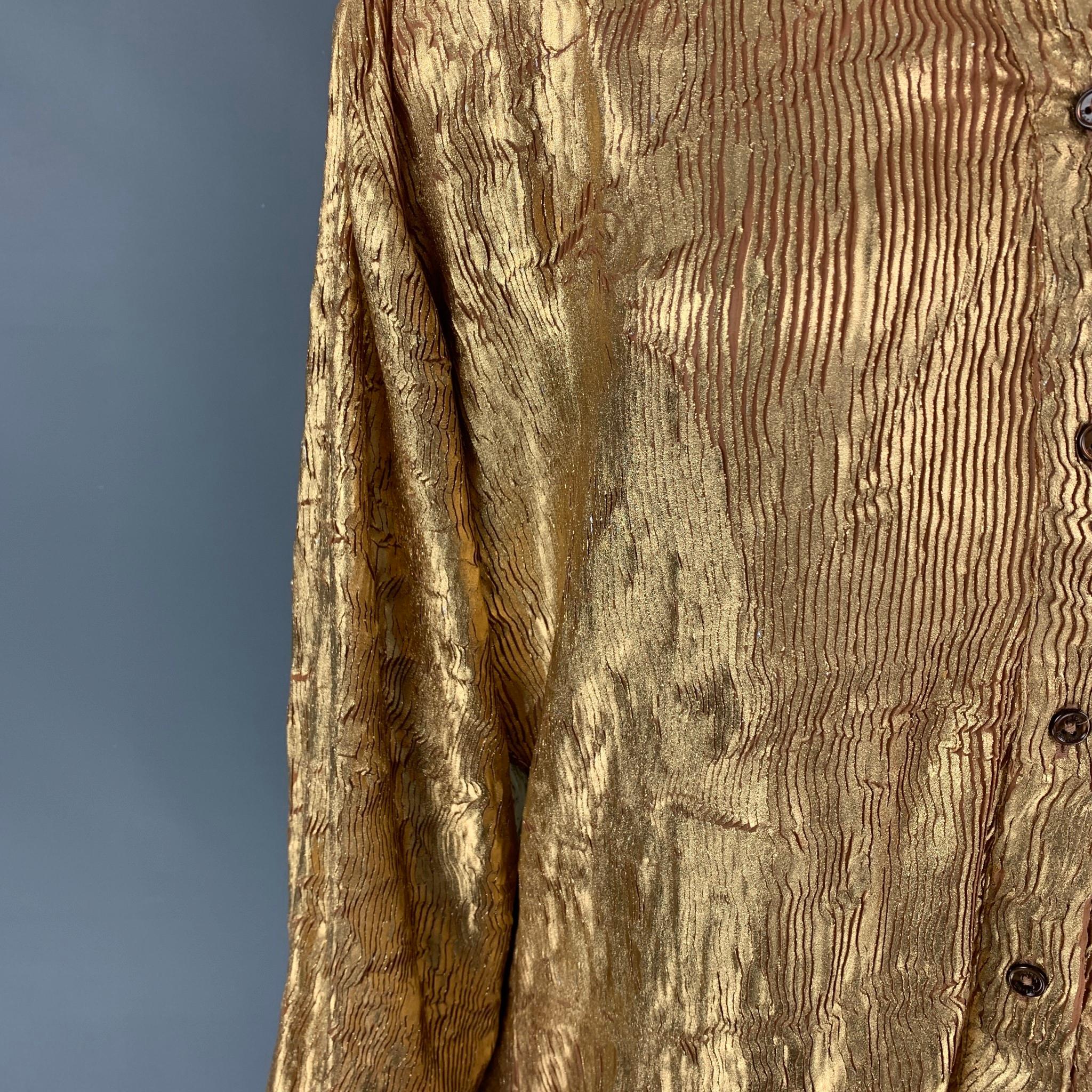 SIES MARJAN shirt comes in a gold crackled material featuring a loose fit, patch pocket, spread collar, and a button up closure. 

Excellent Pre-Owned Condition. Fabric tag removed.
Marked: 2

Measurements:

Shoulder: 19 in.
Bust: 40 in.
Sleeve: