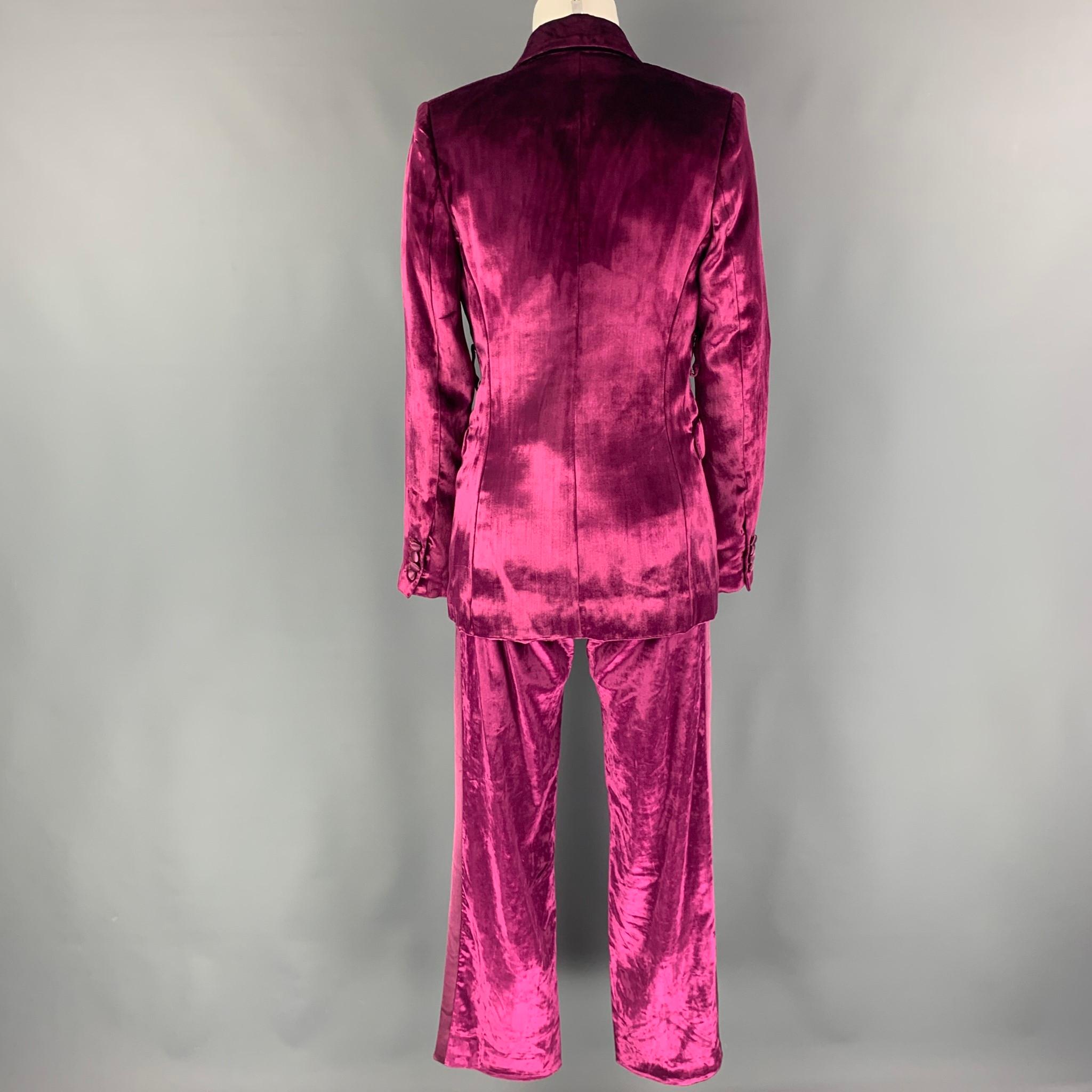 SIES MARJAN suit comes in a magenta velvet cotton / viscose with a full liner and includes a single breasted,  double button sport coat with a notch lapel and matching flat front trousers.

Excellent Pre-Owned Condition.
Marked: