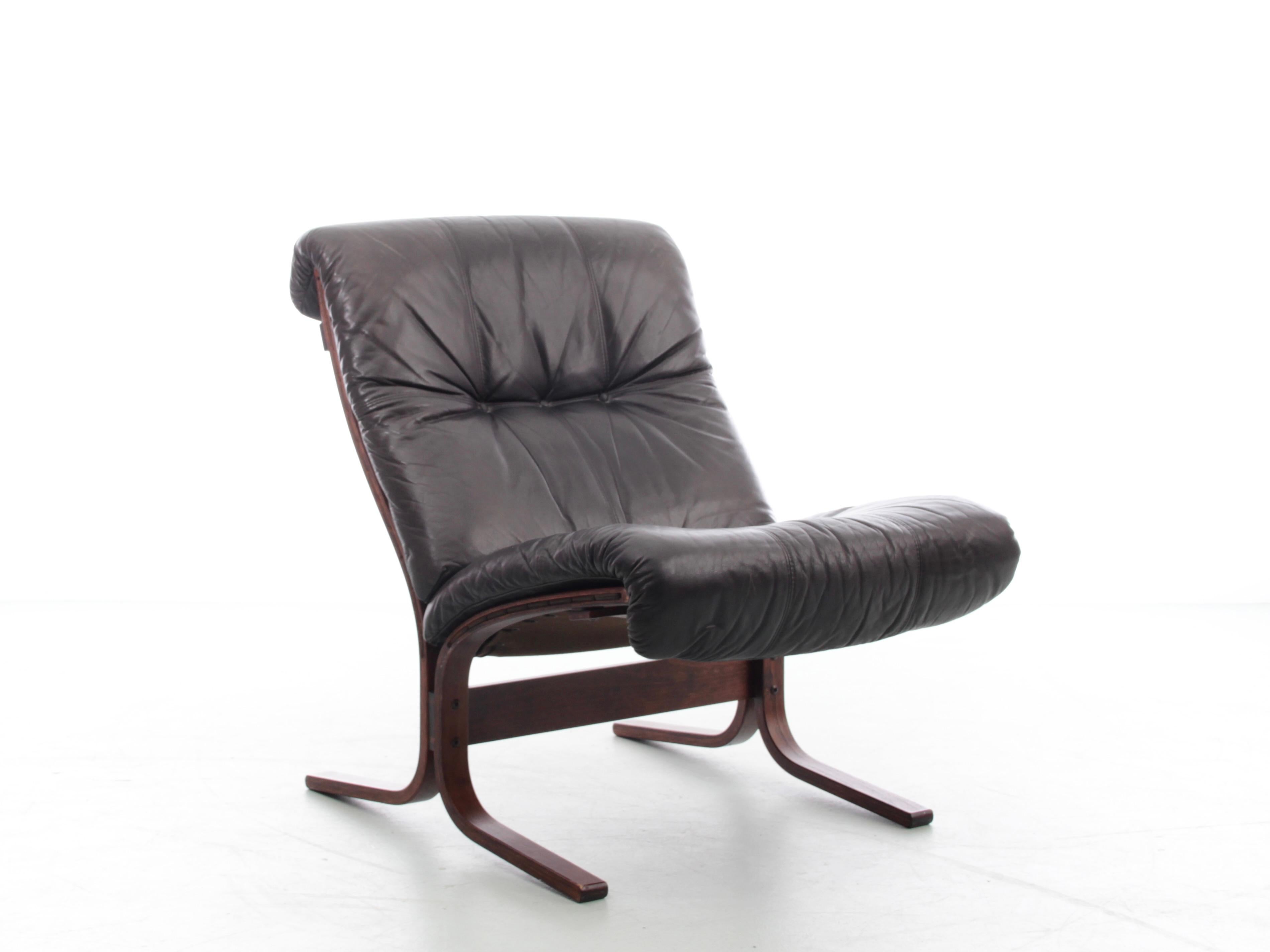 Siesta chair low back  by Ingmar Relling . Black leather. Excellent original condition.