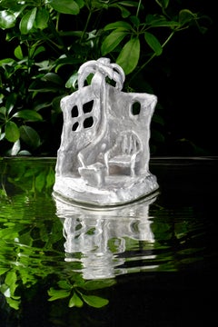 Handmade Aluminium cast sculptural candle holder depicting 'Siesta'