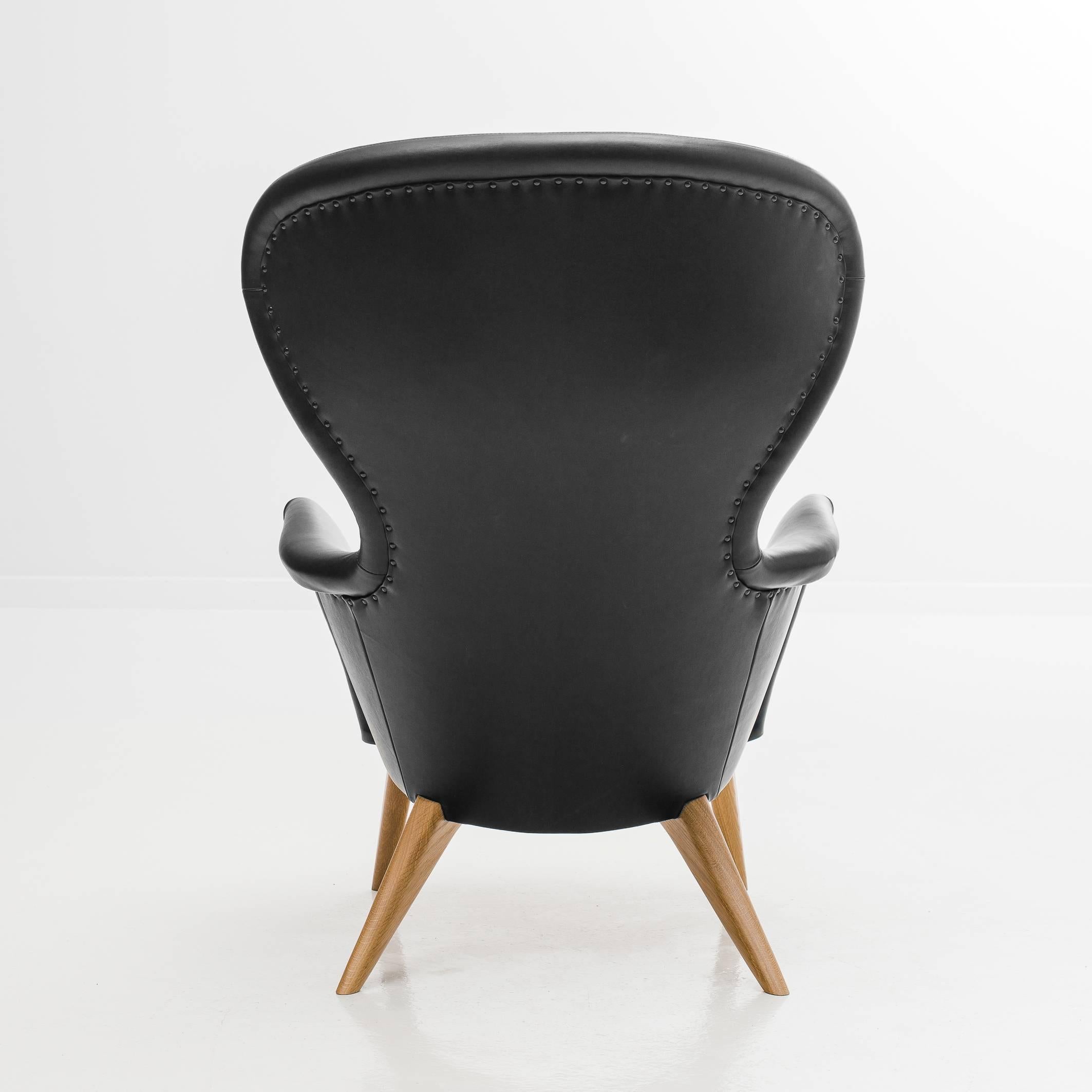 Siesta Lounge Chair in Black Leather Design by Carl Gustav Hiort af Ornäs In Excellent Condition For Sale In Hollola, FI