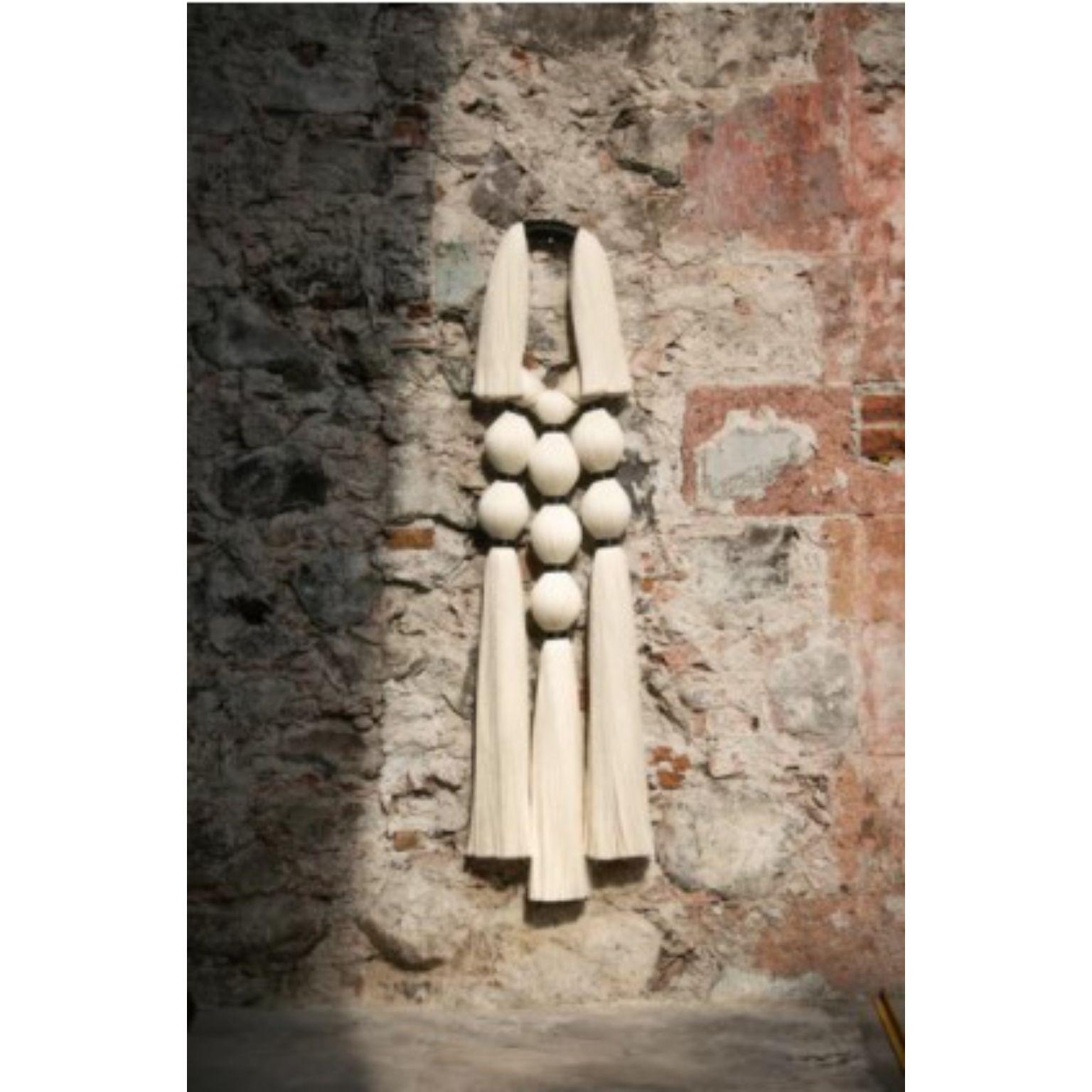 Siete Brujas back wall decoration by Caralarga
Dimensions: D 37 x W 10 x H 160 cm
Materials: 100% raw cotton thread, waxed cord, paper maché spheres.
Handmade

Caralarga is a textile design and production workshop inspired by nature’s raw