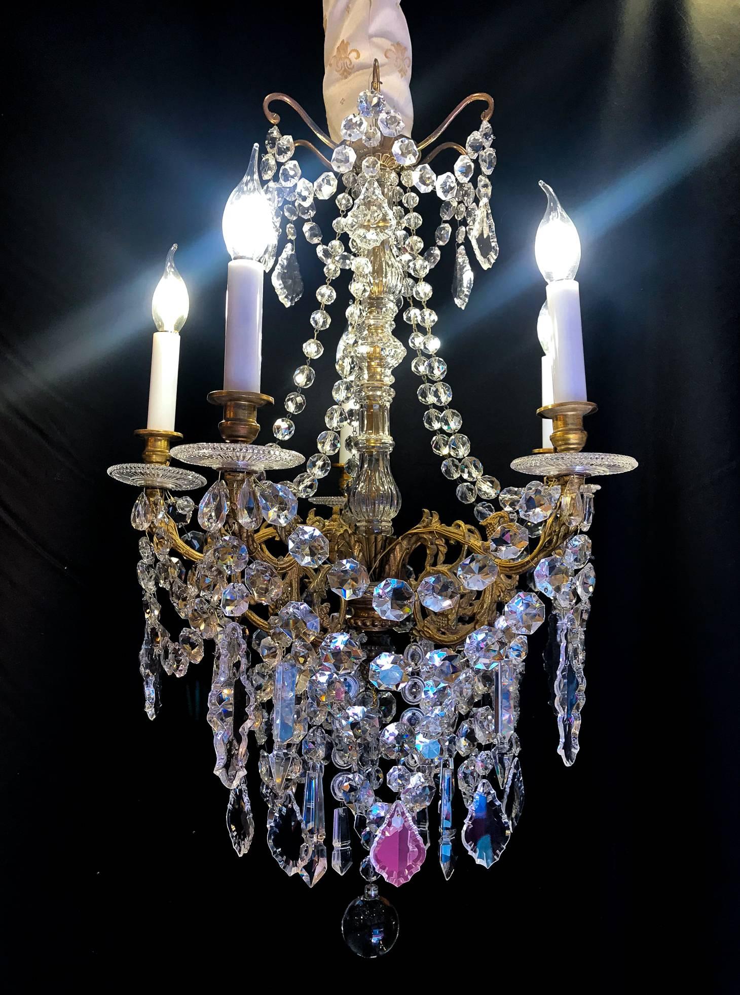 We are pleased to present you a nicely ormolu and white hand-cut crystal, form “tige” chandelier in the classic Louis XVI style. Our chandelier is composed of five arm-lights. Original gilt-bronze, finely chiseled.
Beautiful quality hand-cut