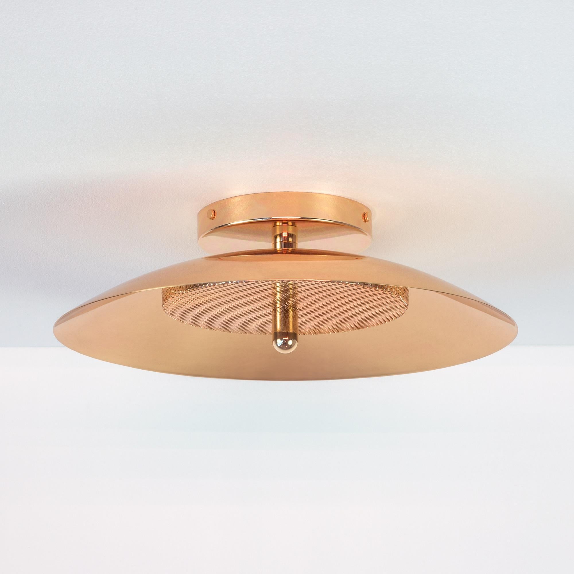 Composed of a spun metal shade that reflects light filtered through a perforated metal diffuser, the subtle warmth of the signal sconce is perfectly balanced by it’s striking form. With their refined lines and numerous finish options, Signal sconces