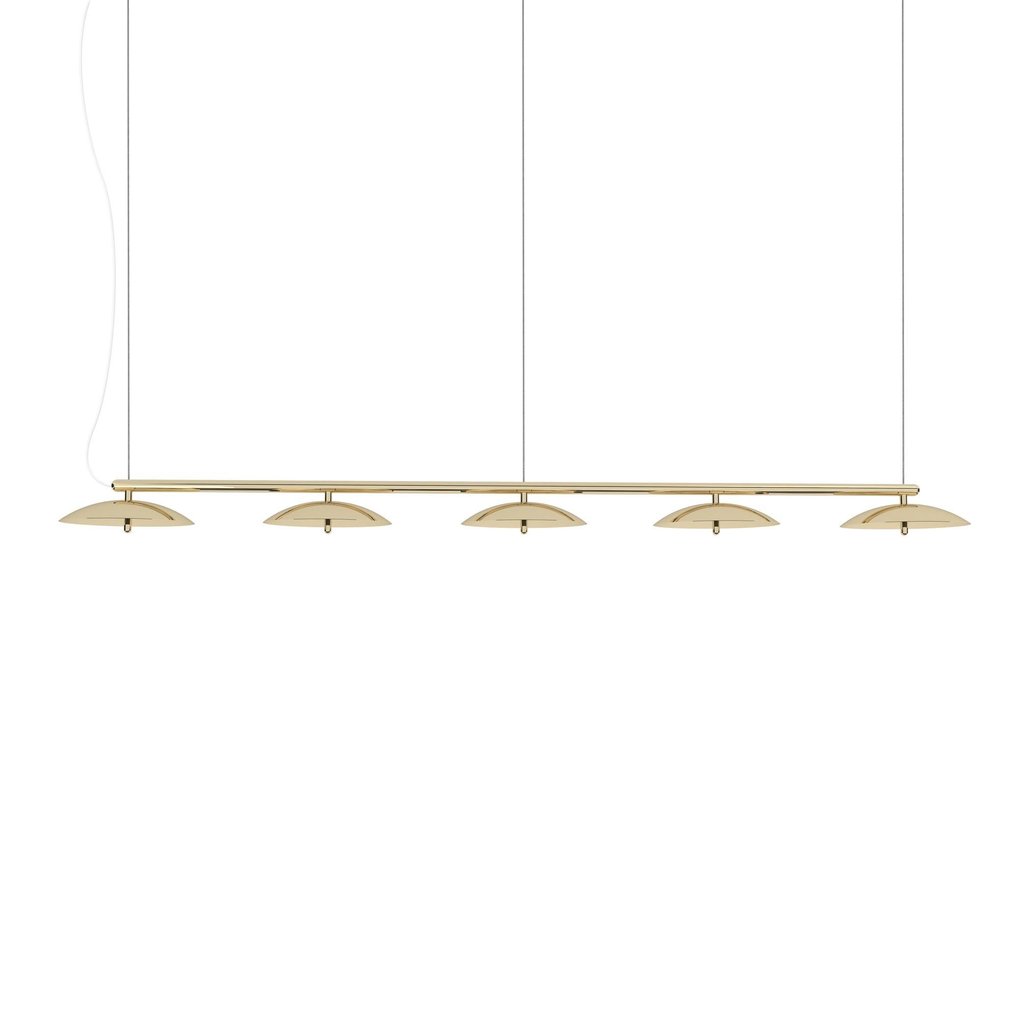 Perfect above a dining table or a conference table, the Signal Linear Pendant is a decidedly modern linear suspension light. A polished metal arm effortlessly supports spun metal shades that cast a downward glow through perforated diffusers. The