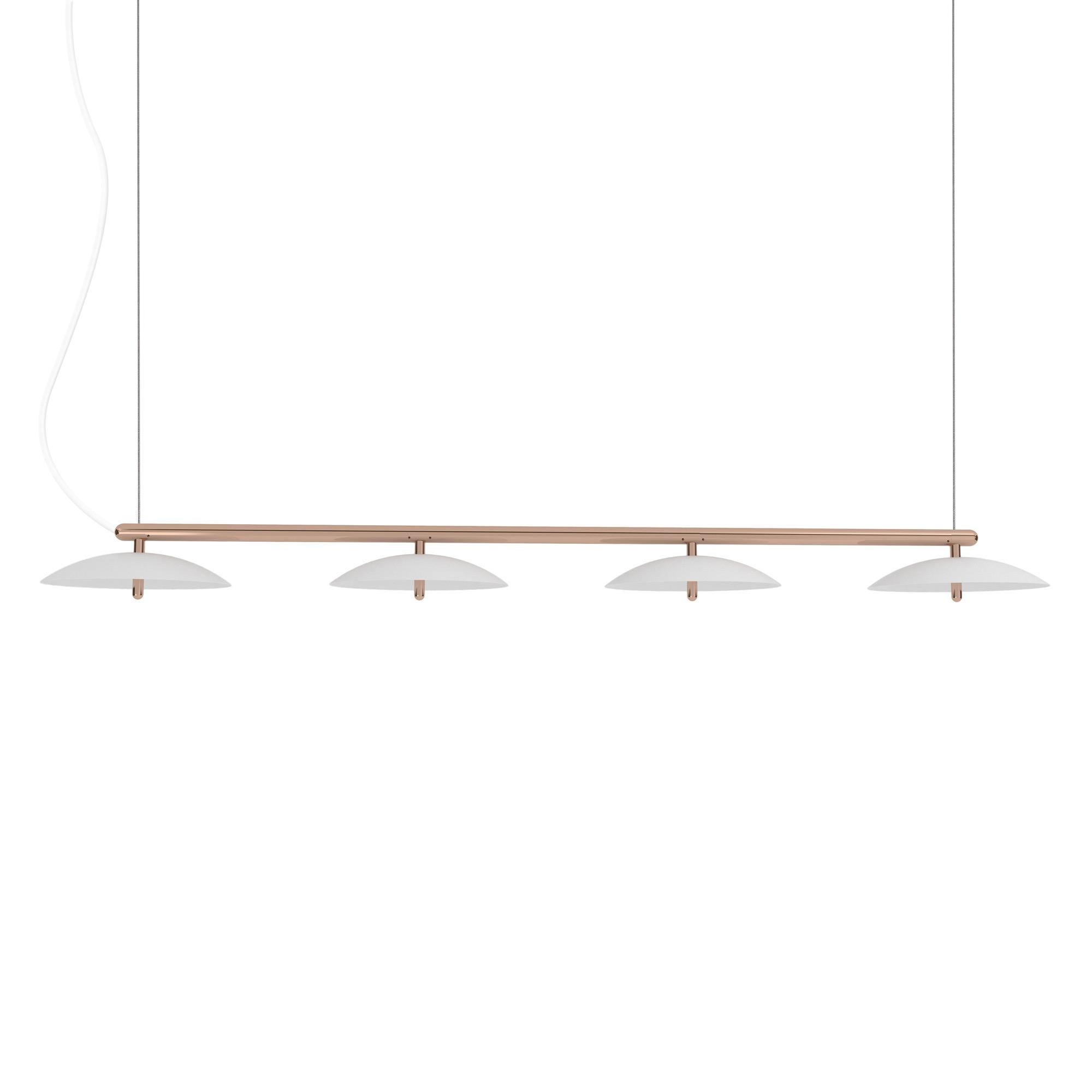 Perfect above a dining table or a conference table, the signal linear pendant is a decidedly modern linear suspension light. A polished metal arm effortlessly supports spun metal shades that cast a downward glow through perforated diffusers.