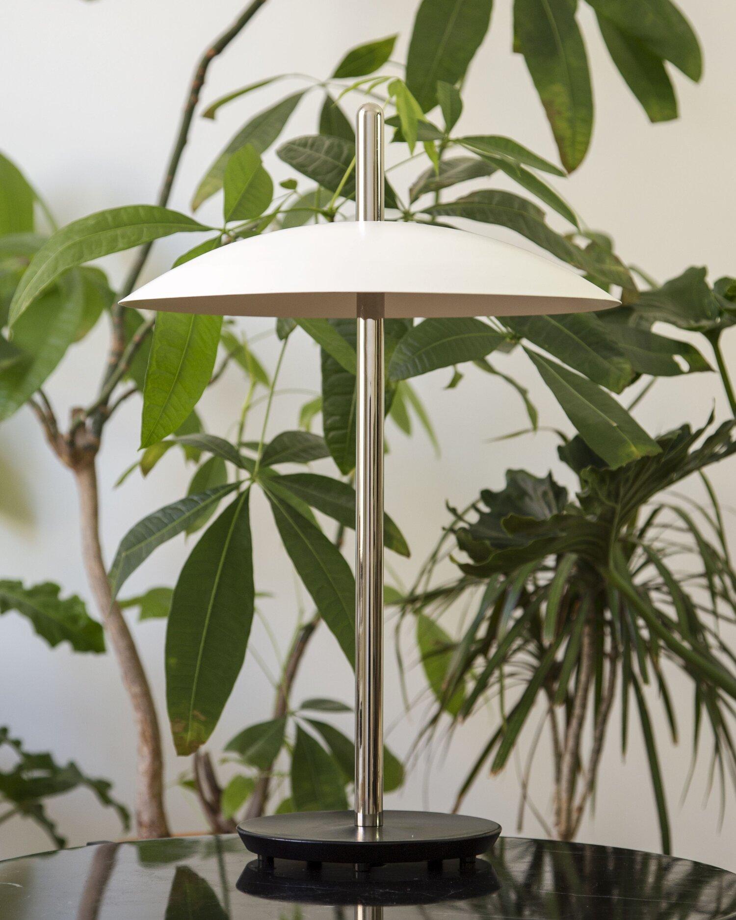 A Modern Beacon of Style and Illumination, the Souda Signal Table Lamp - an embodiment of contemporary design and ambient lighting that adds a touch of sophistication to any space. Crafted with precision and a dedication to aesthetics and