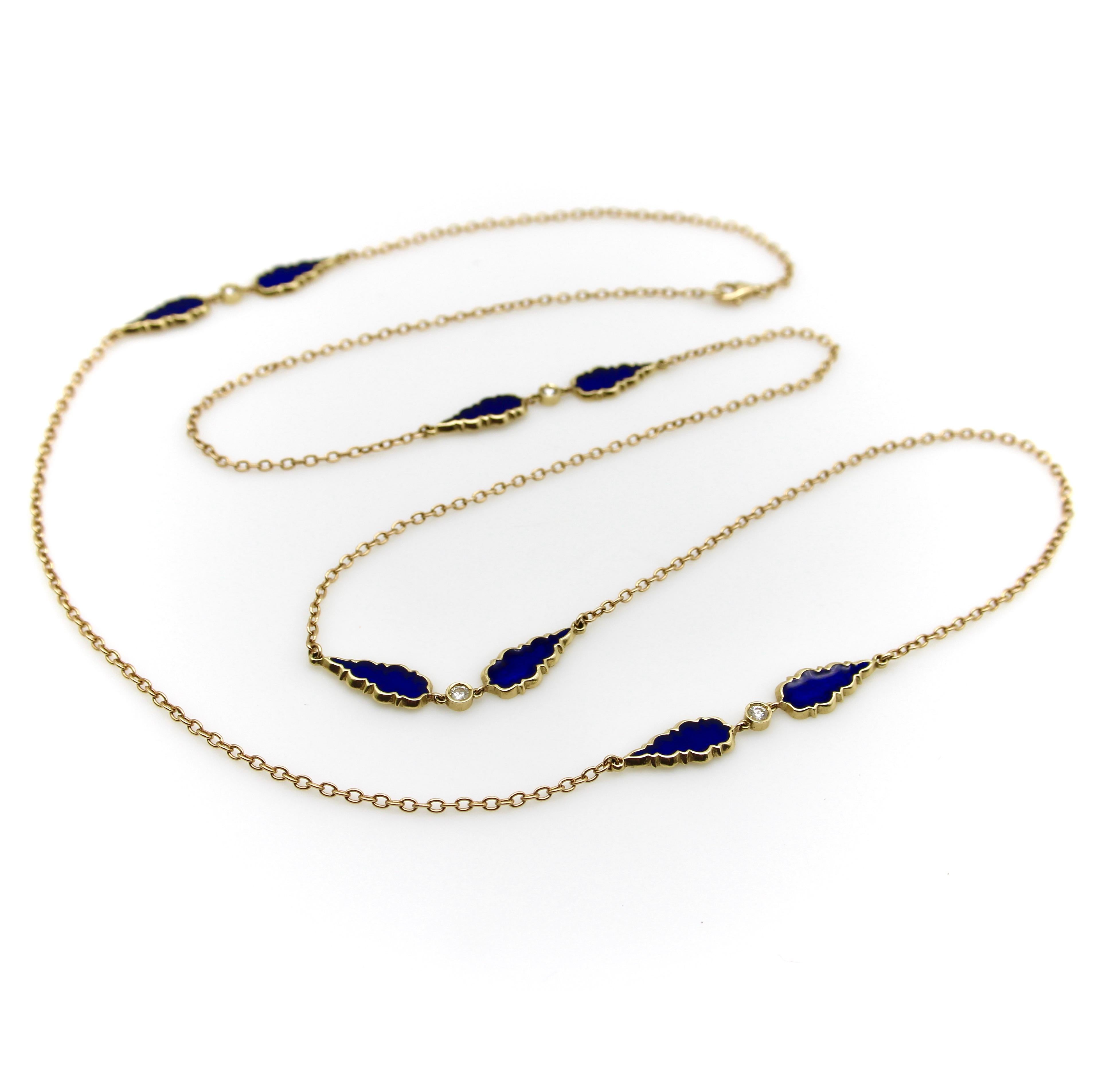 This 14 karat gold blue enamel and diamond station chain features old world jewelry details and impeccable craftsmanship. Elongated gothic teardrop shapes are filled with saturated dark blue enamel on one side, the other has a engraved floral