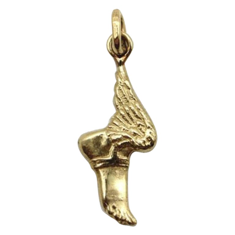 Charme con piede alato Hermes in oro 14K in vendita