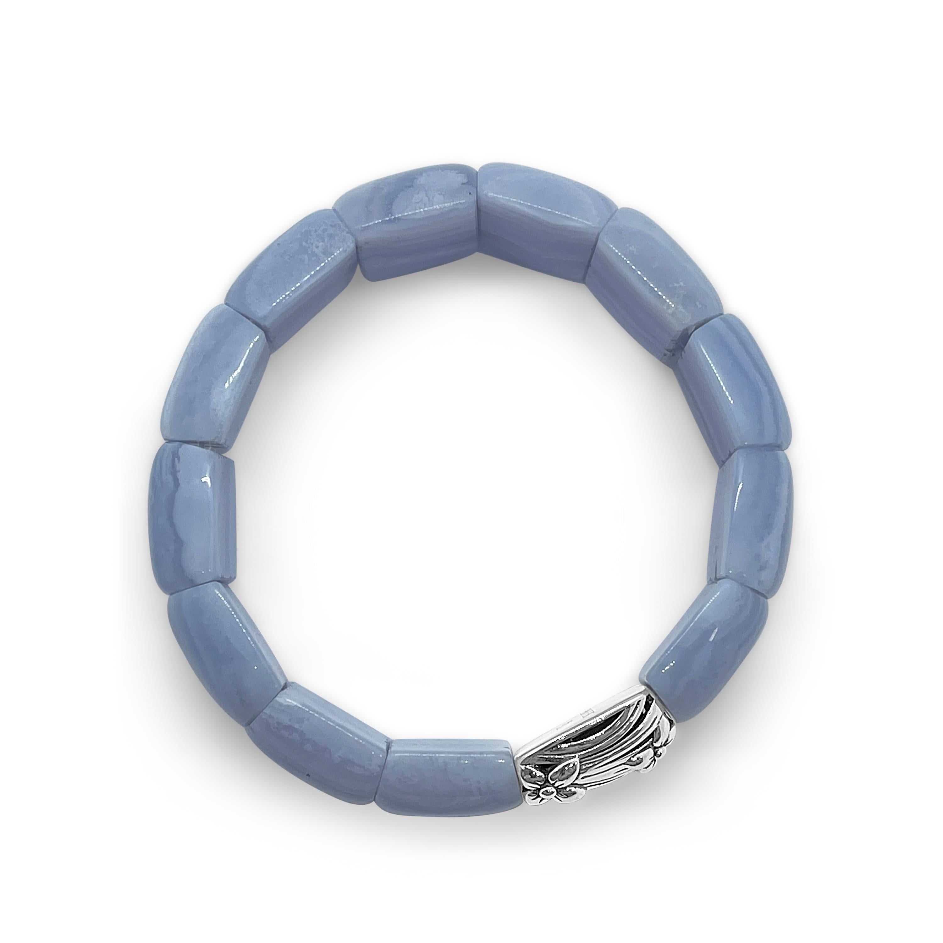 This gorgeous Signature Blue Laced Agate & Sterling Silver Stretch Bracelet is a staple for every look in your wardrobe. Its allure and grandeur make it truly stick out, and its signature work helps contribute to a truly fashionable & bold look. The