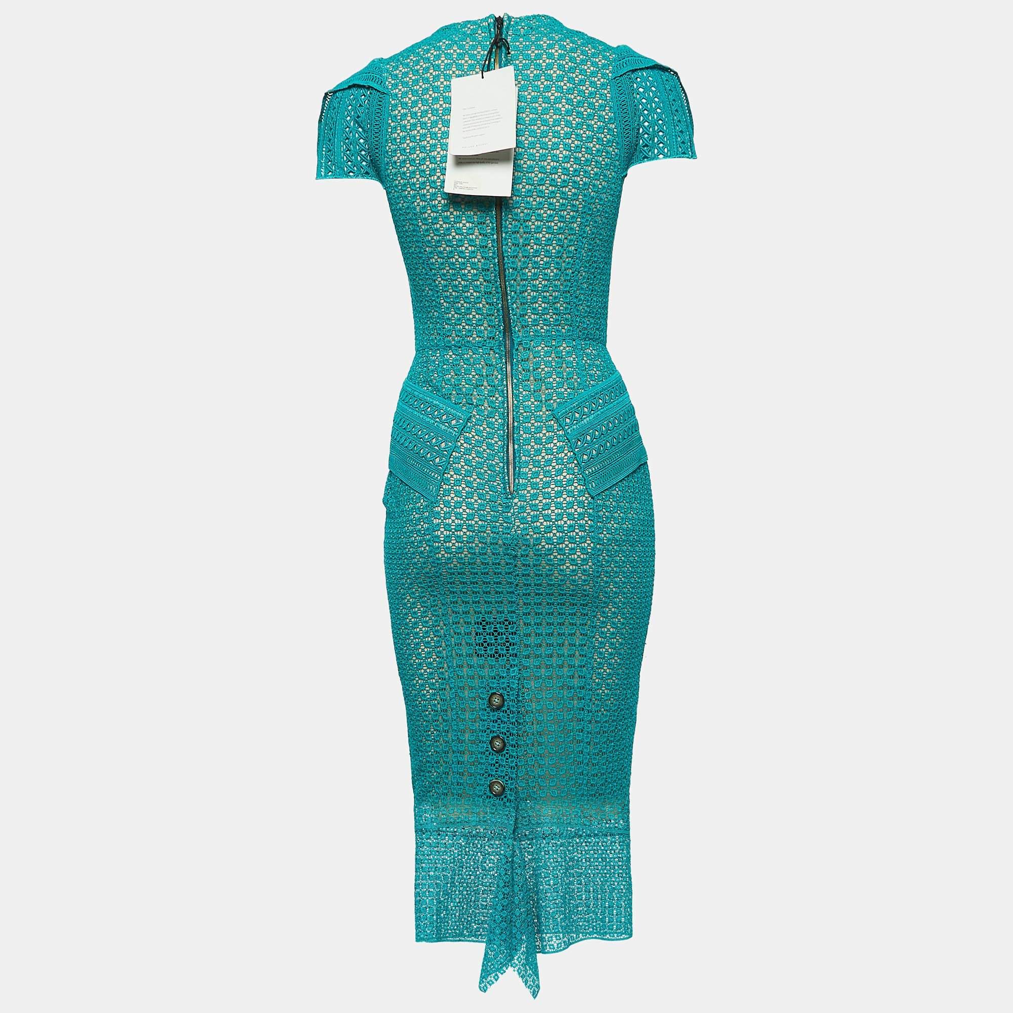 This stylish midi dress exudes elegance and sophistication. Its flattering length falls between the knee and ankle, offering a versatile option for various occasions. With its chic design, it combines luxe details with timeless charm, making it a