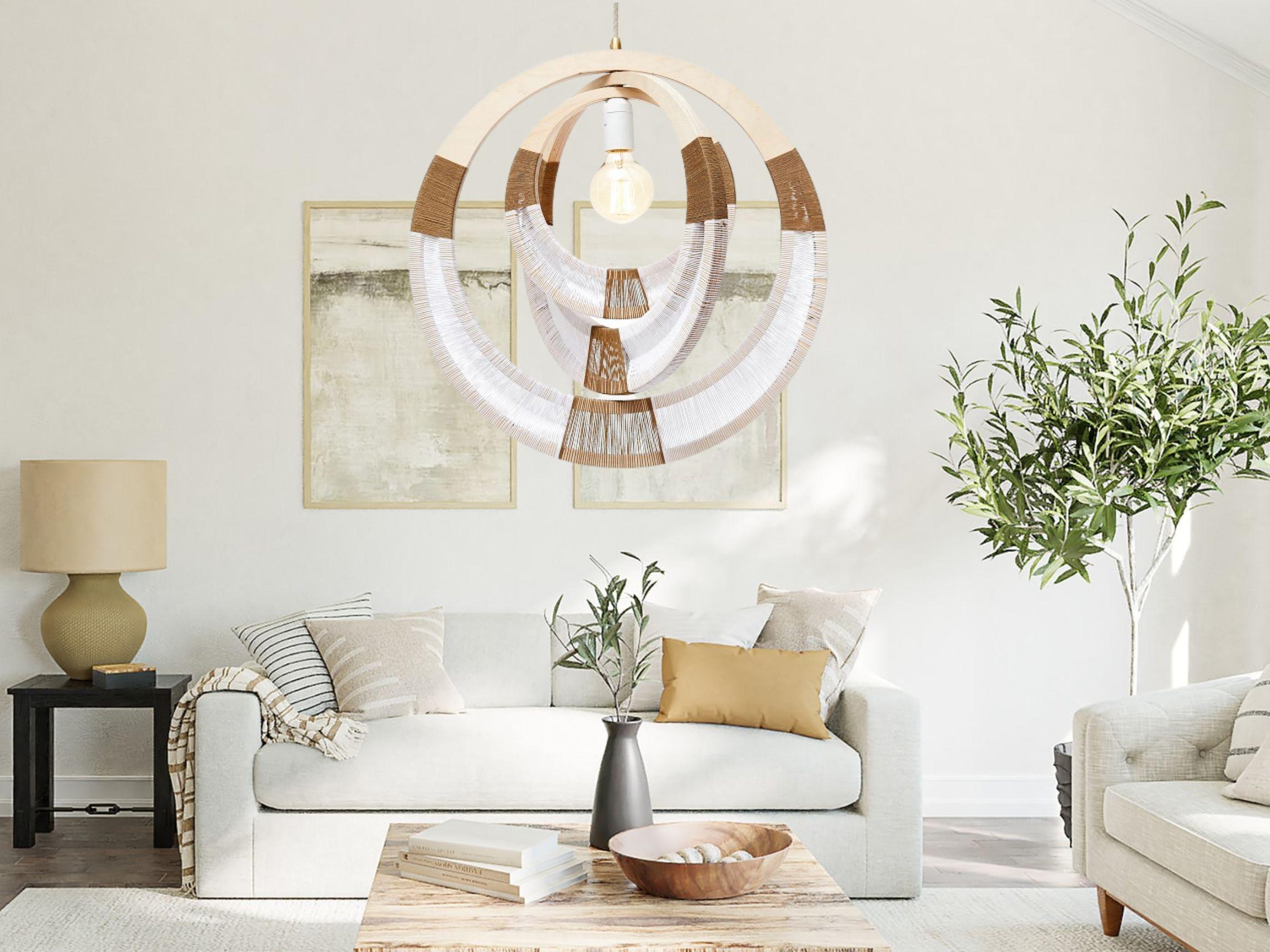 Illuminate your space with style and sophistication. This designer pendant light is the perfect statement piece for any room.

Its elegant and geometric shape through the use of wooden rings, is the perfect flair for that eclectic vibe!

The