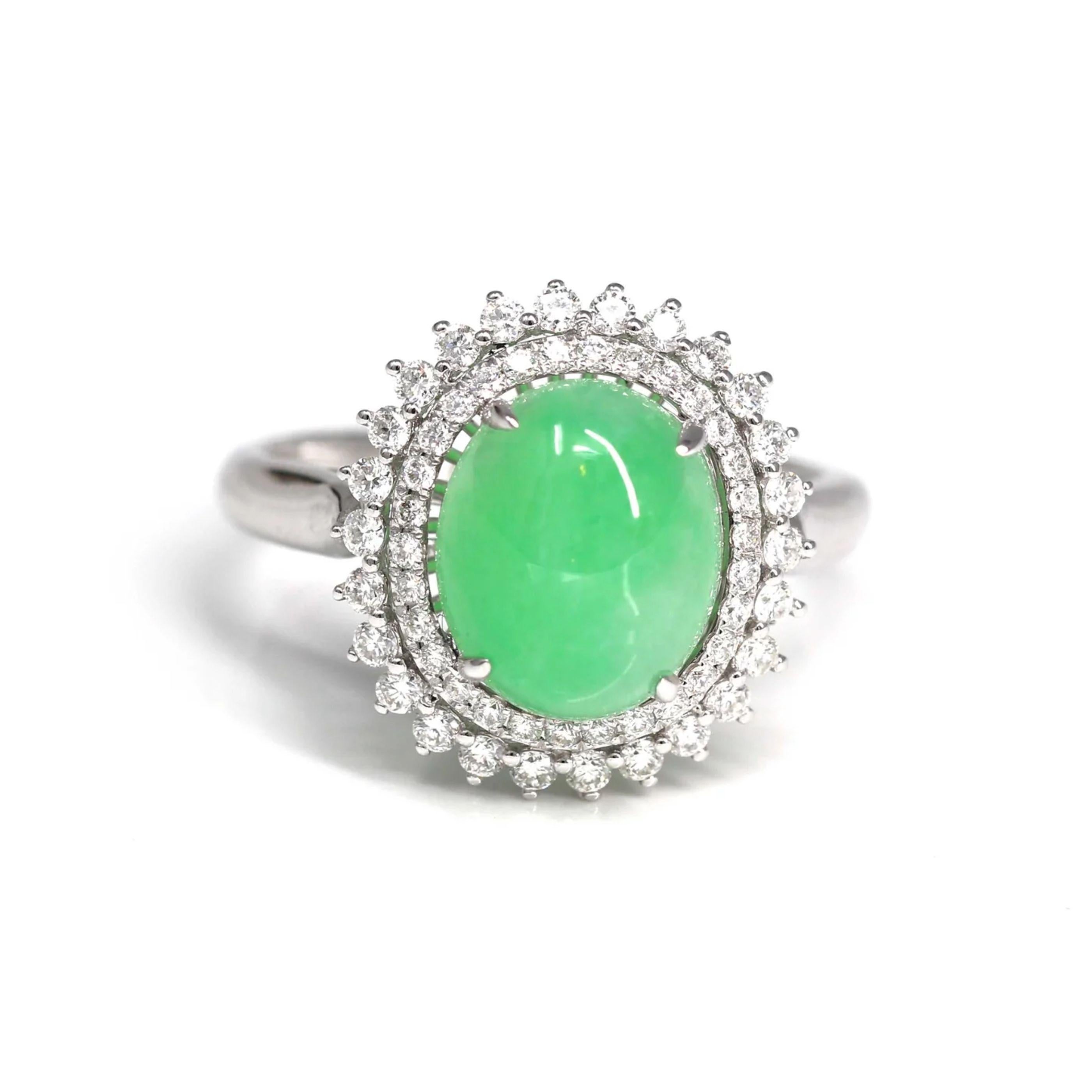 * DESIGN CONCEPT--- Inspired by the natural beauty of genuine Burmese Imperial Green Jadeite, the rich, beautiful apple green color is found on no other stone. This one of a kind engagement ring combines the natural beauty of the extremely rare gem