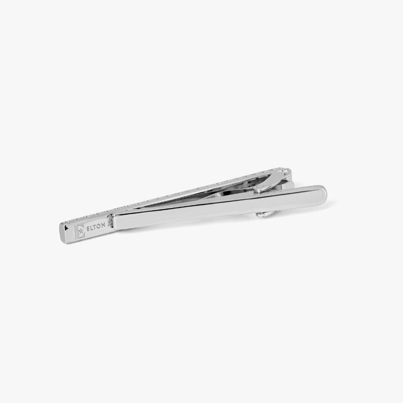 Signature Elton John Logo Tie Clip with Swarovski Elements

Rhodium plated base metal peices with the signature Elton John ‘E’ logo. The background of the peices are hand enamelled creating a smooth black polished finish, clear SWAROVSKI ELEMENTS
