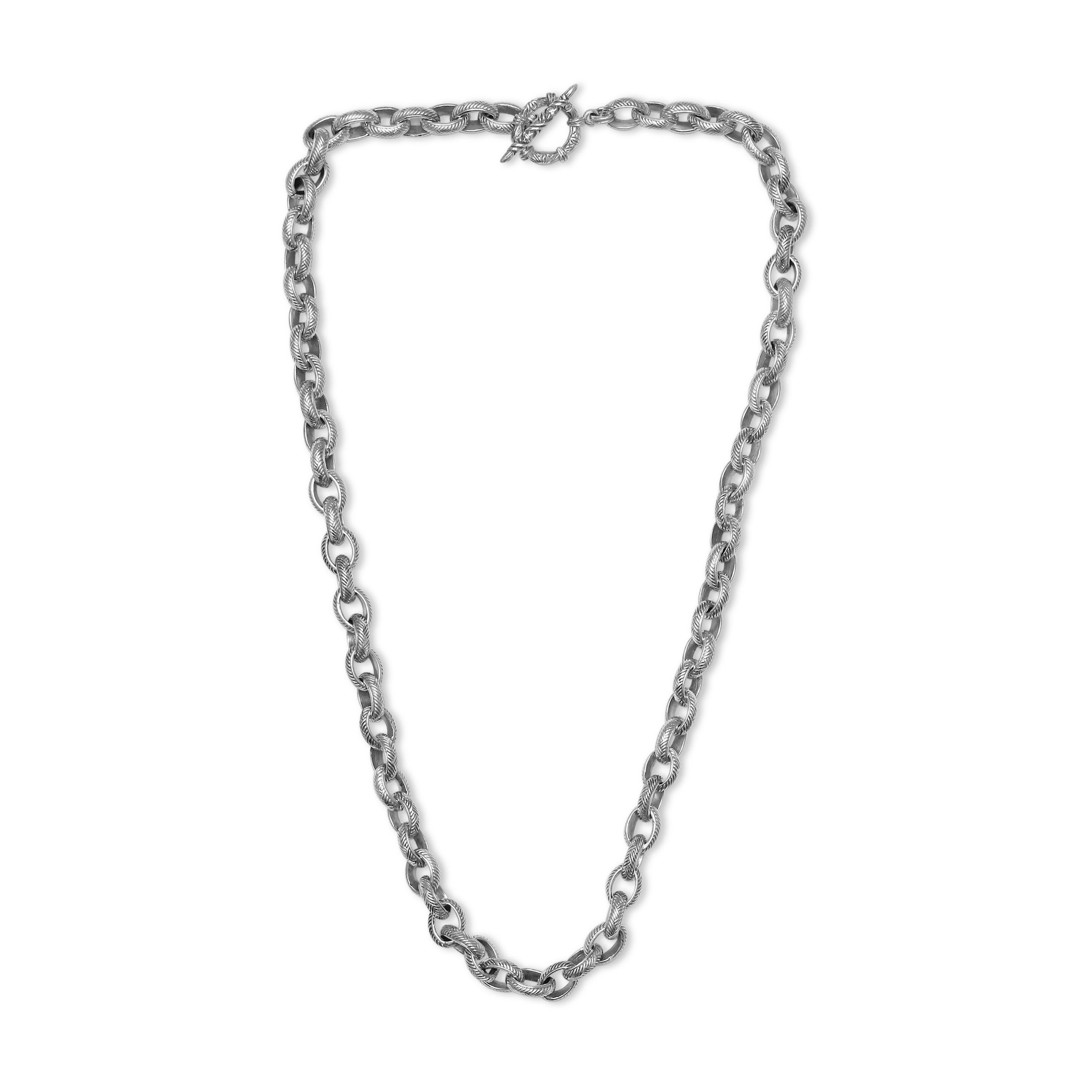 
Immerse yourself in the timeless allure of Stephen Dweck's Orogneto Collection with the Signature Engraved Weave Linked Sterling Silver Chain Necklace. Crafted with meticulous artistry in 925 sterling silver and measuring 18