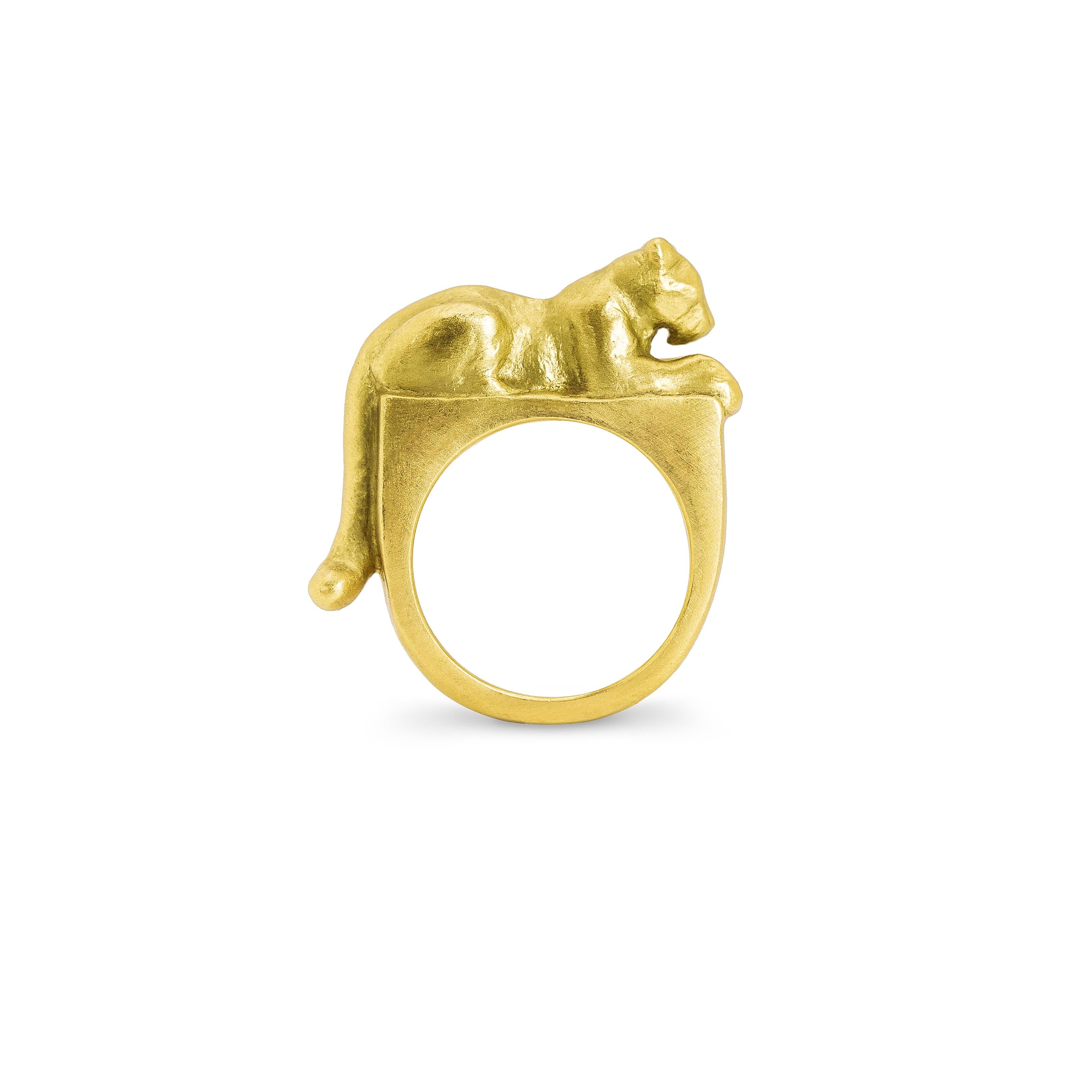 This heirloom-quality collectible will have you roaring with delight! Handcrafted in 18K gold, this chic ring is a true statement piece that will elevate any outfit. With its bold and timeless design, it's the perfect way to add some feline flair to