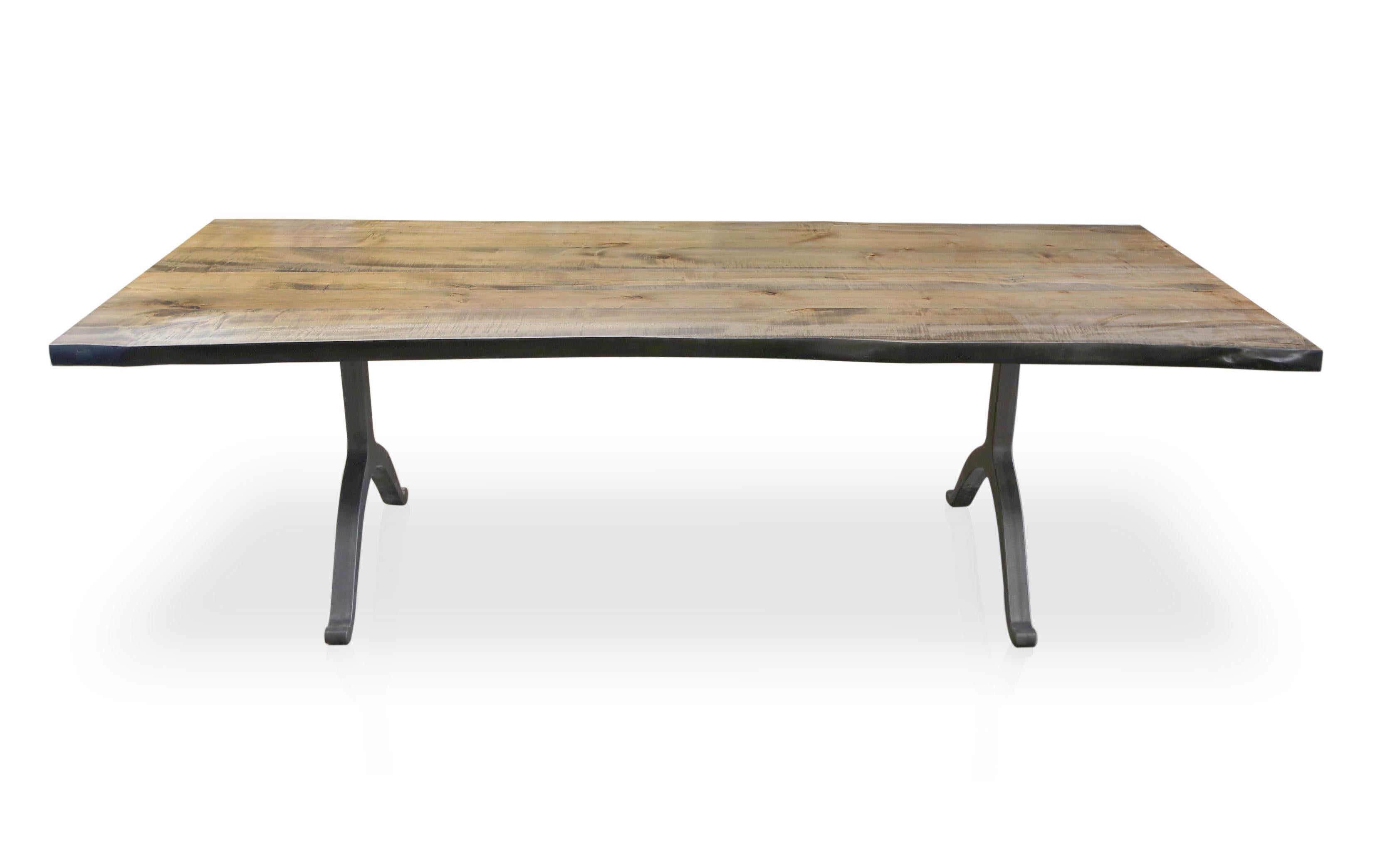 Solid American maple live edge tabletop with a grey driftwood finish, paired with our solid blackened steel wishbone legs. 84 x 36

Our tables let the maple grain speak for itself with a durable clear coat finish over the wood and a grey stain that
