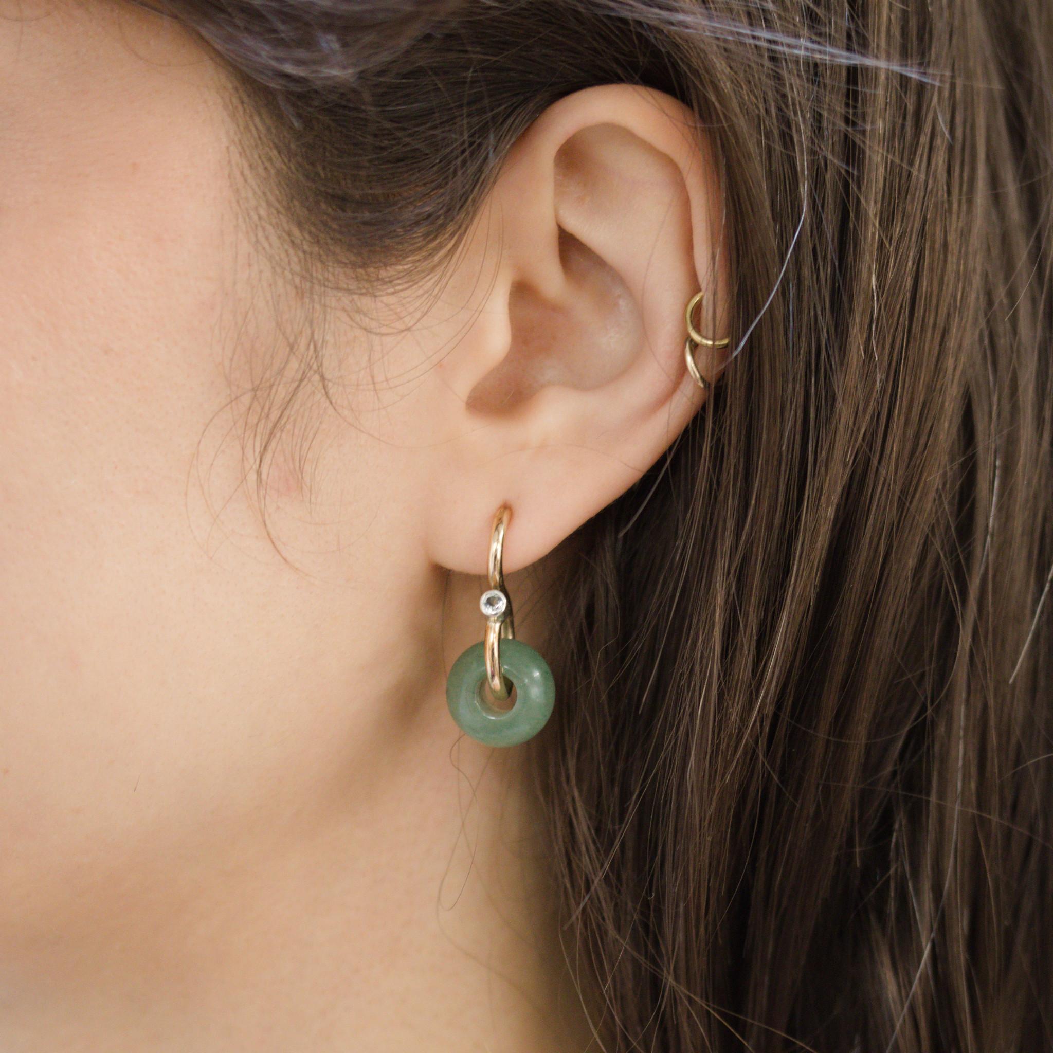 Inspired by the S shaped chain link created for the poise necklace, the signature poise earrings featuring aventurine and white topaz transform the simple hook design into an elegant yet modern piece of jewellery. A unique shape, the poise earring