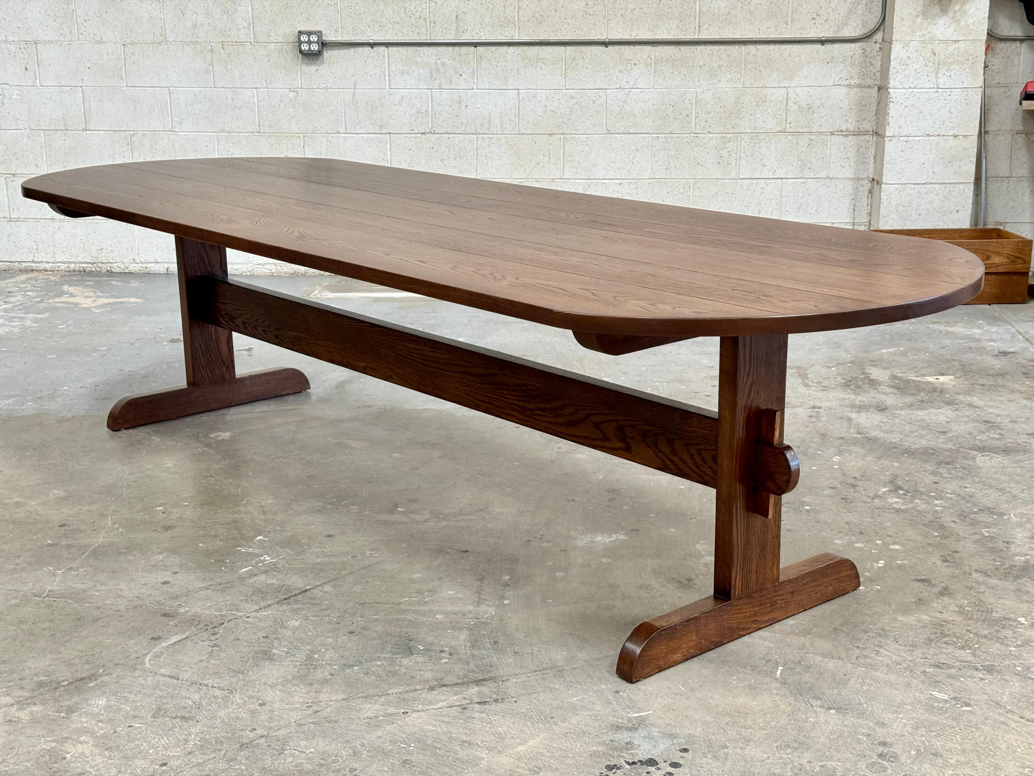 This walnut dining table is seen here in 120