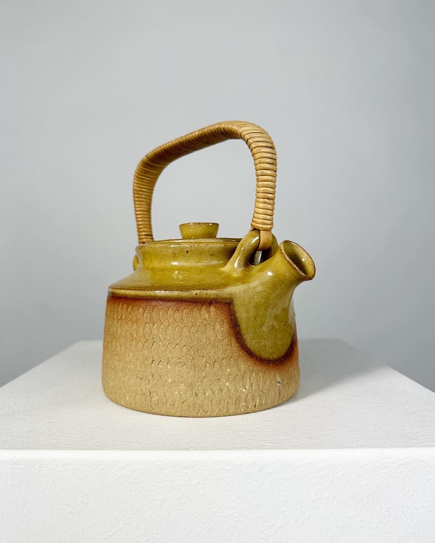 Hand-Crafted Signe Persson Melin Teapot Relief Pattern Woven Cane Handle Sweden 1950s For Sale