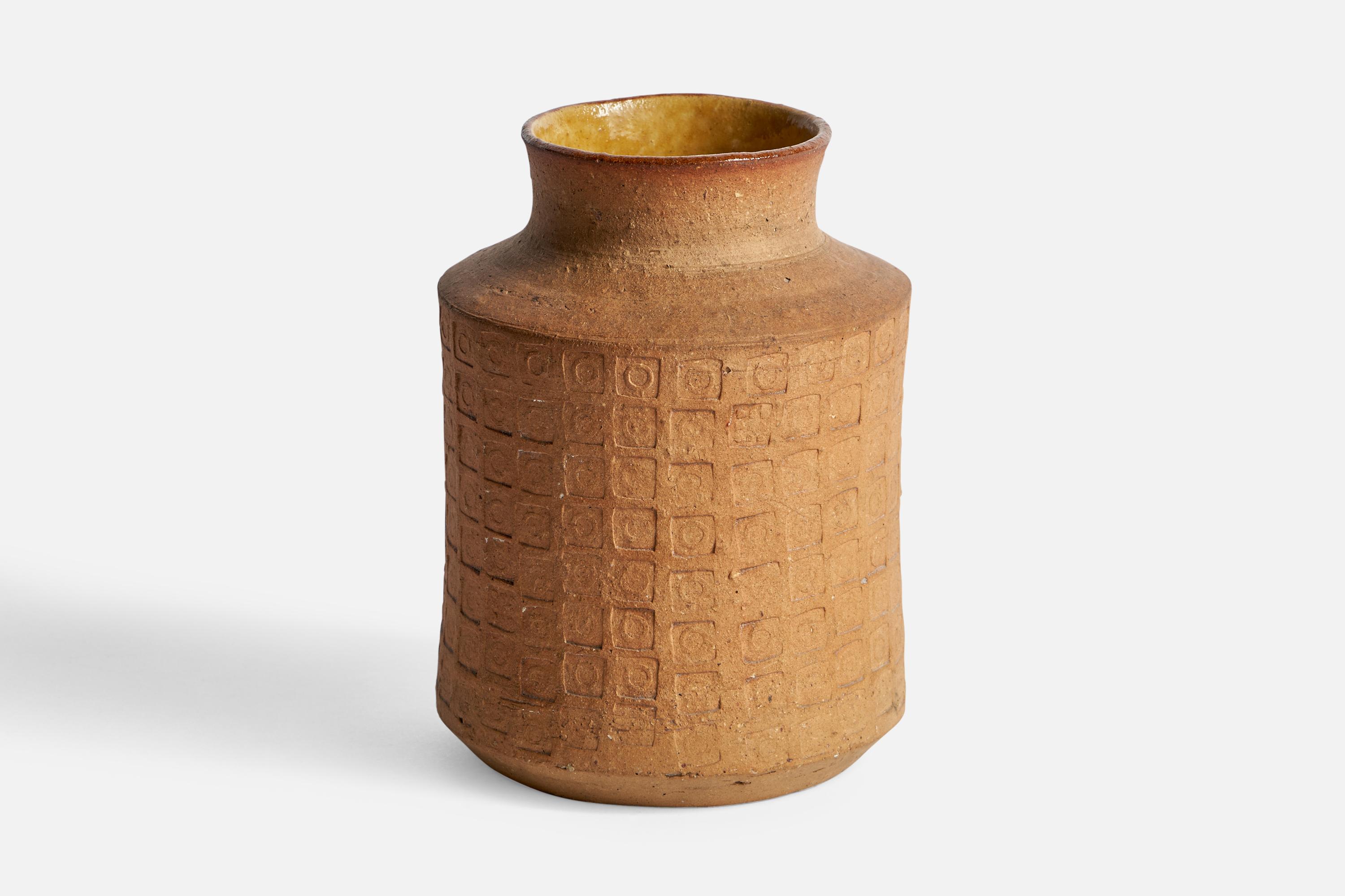 An incised beige ceramic vase designed and produced by Signe Persson-Melin, Sweden, 1953.