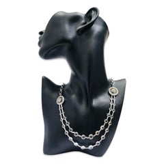 Collier double brin signé en diamant 18k et quartz cristal avec motif en forme de noeud