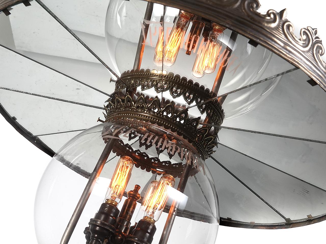 This is a real interesting Humphrey gas lamp. Its signed in 2 places... etched into the globe and dated as well on the bottom shade holder. The gas jets were wired and the fixture now uses 4 E12 Bulbs. The shade a 20 inch diameter and is unsigned