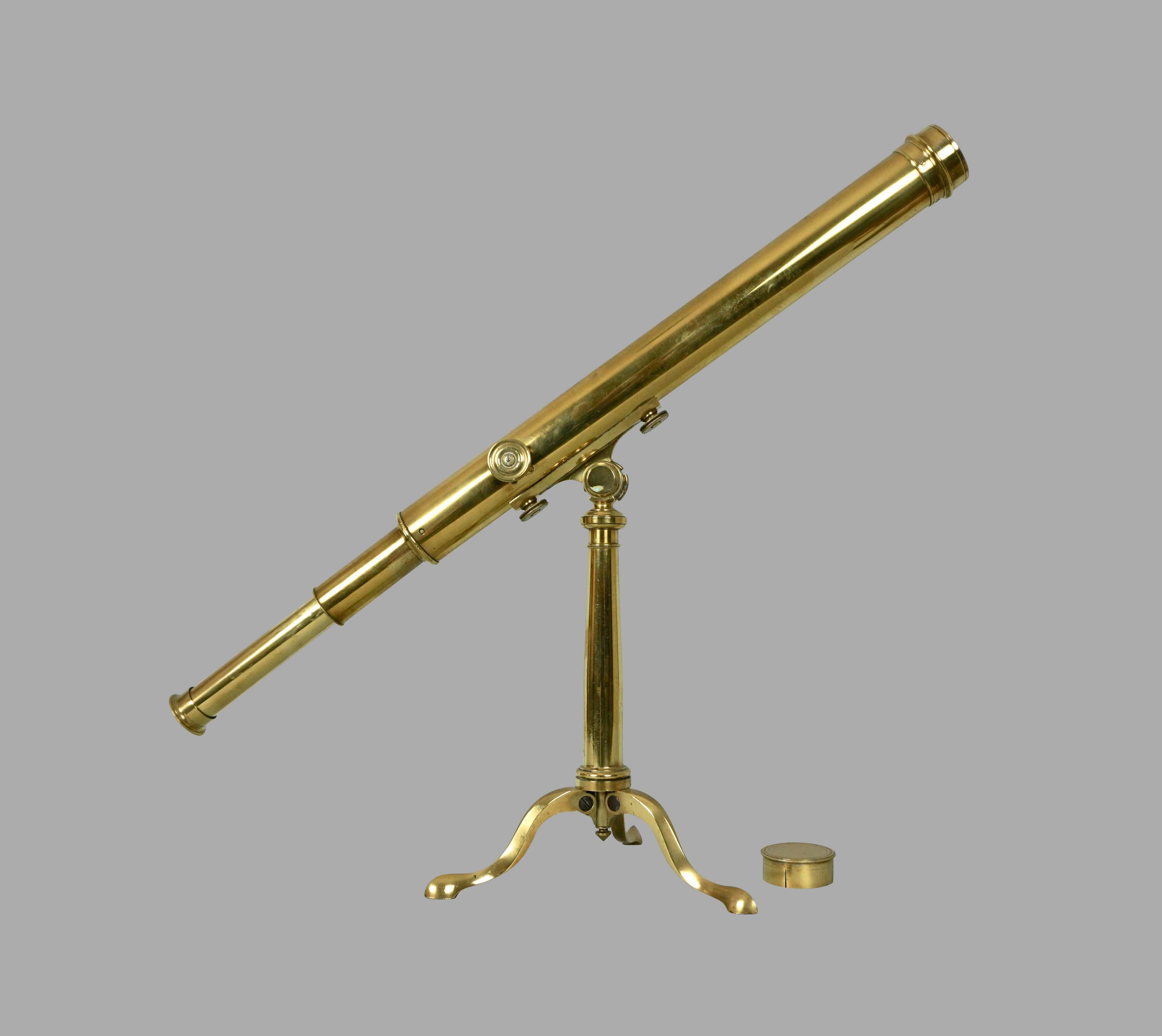 A French 2 inch diameter brass refracting telescope retaining its original tripod, signed on the barrel 