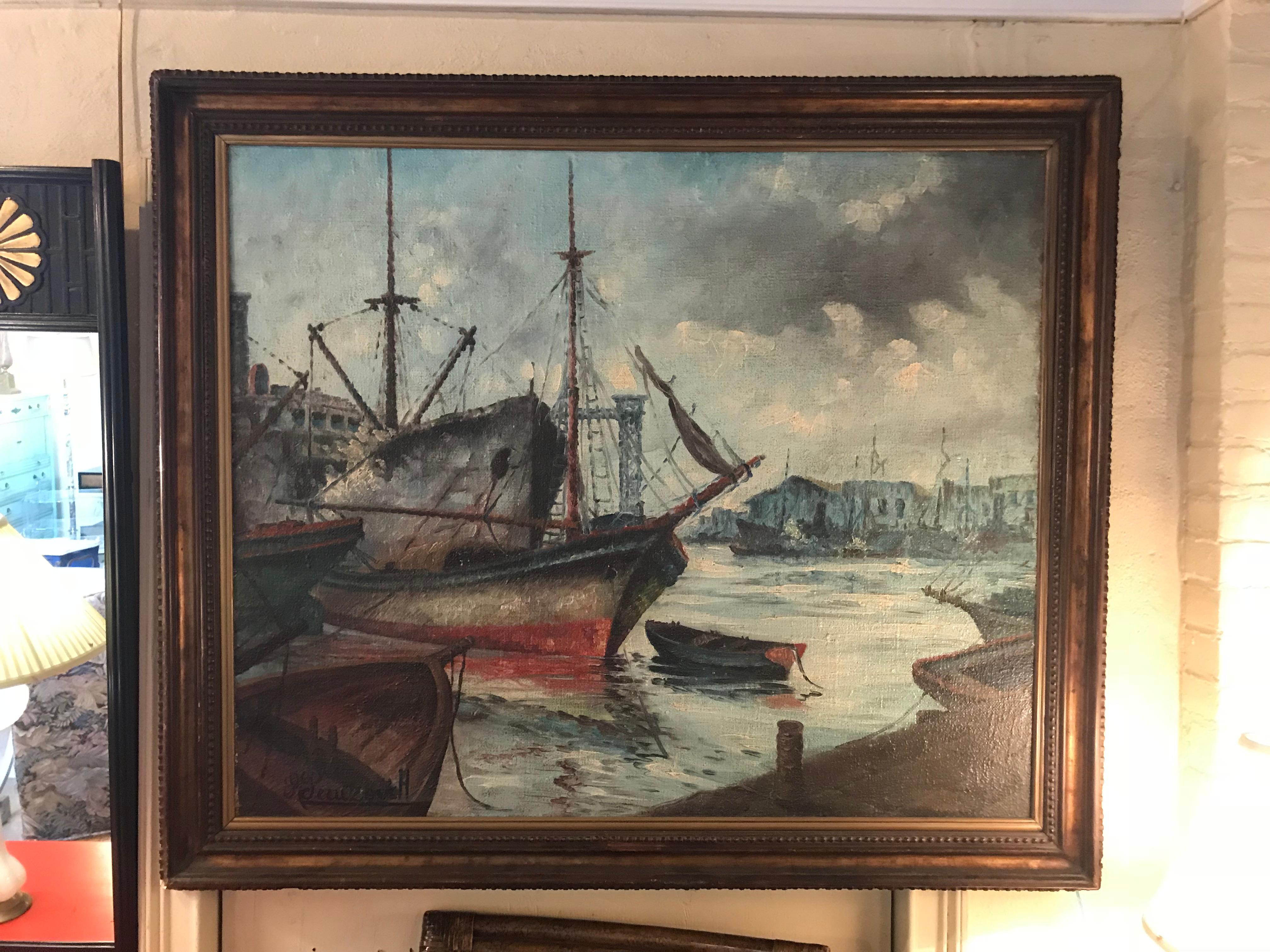 Signed 19th or early 20th century oil painting boats docked at the port. This finely detailed oil on canvas depicts several boats and fishing vessels docked at the port on a cloudy day. Set in a custom gilt gold and ebony frame signed in the lower