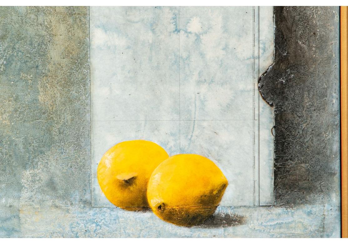 A large and Poetic mixed media artwork in gilt and lacquered frame. Signed lower left. Painted sections of board and paper superimposed. A fragment of a carpet above, a printed paper announcement with painted lemons lower right, and a mottled gray