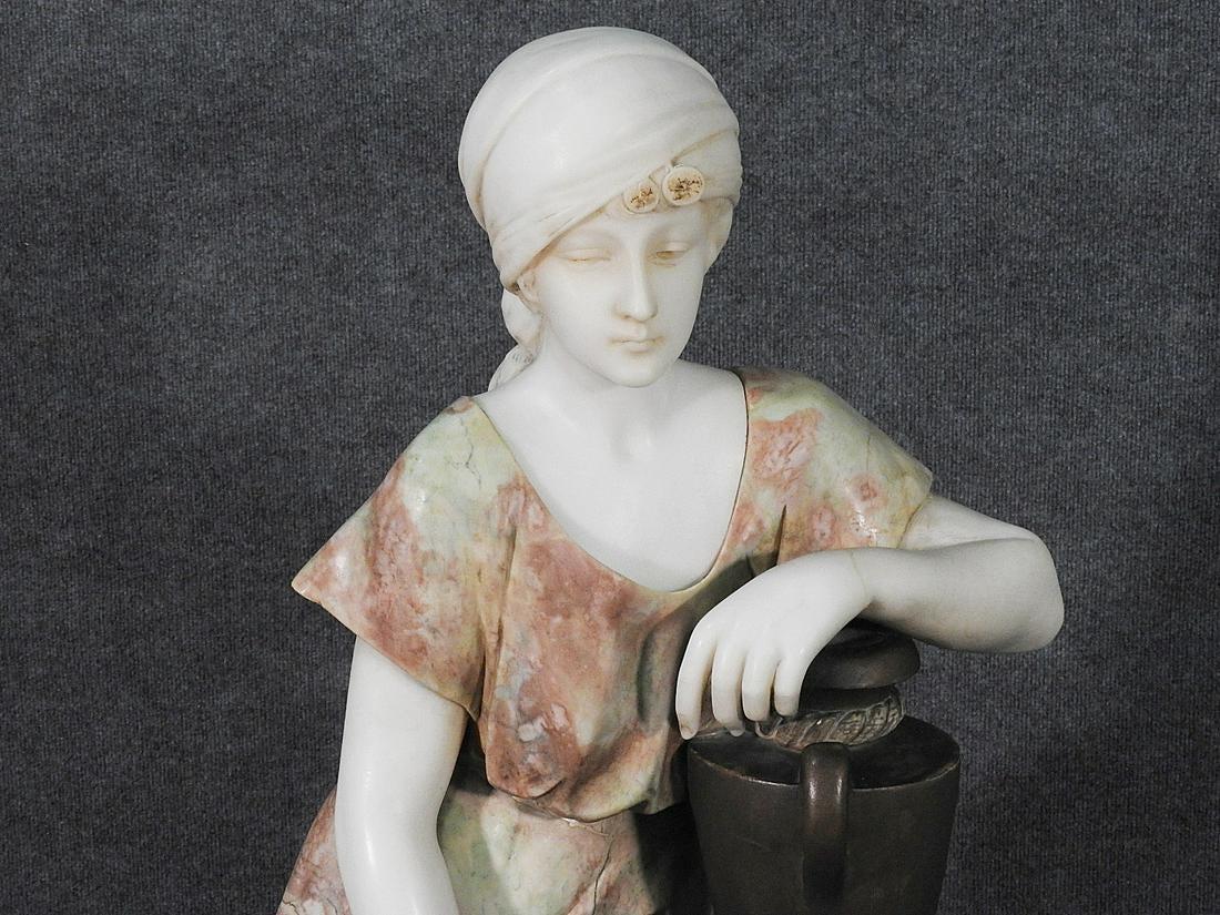 This is a fantastic Adolfo Cipriani, a very well-known Italian sculptor who did particular sensitive sculptures of young women with various poses and scenes. This piece is one of the finest we have ever had by this sculptor and is very large and