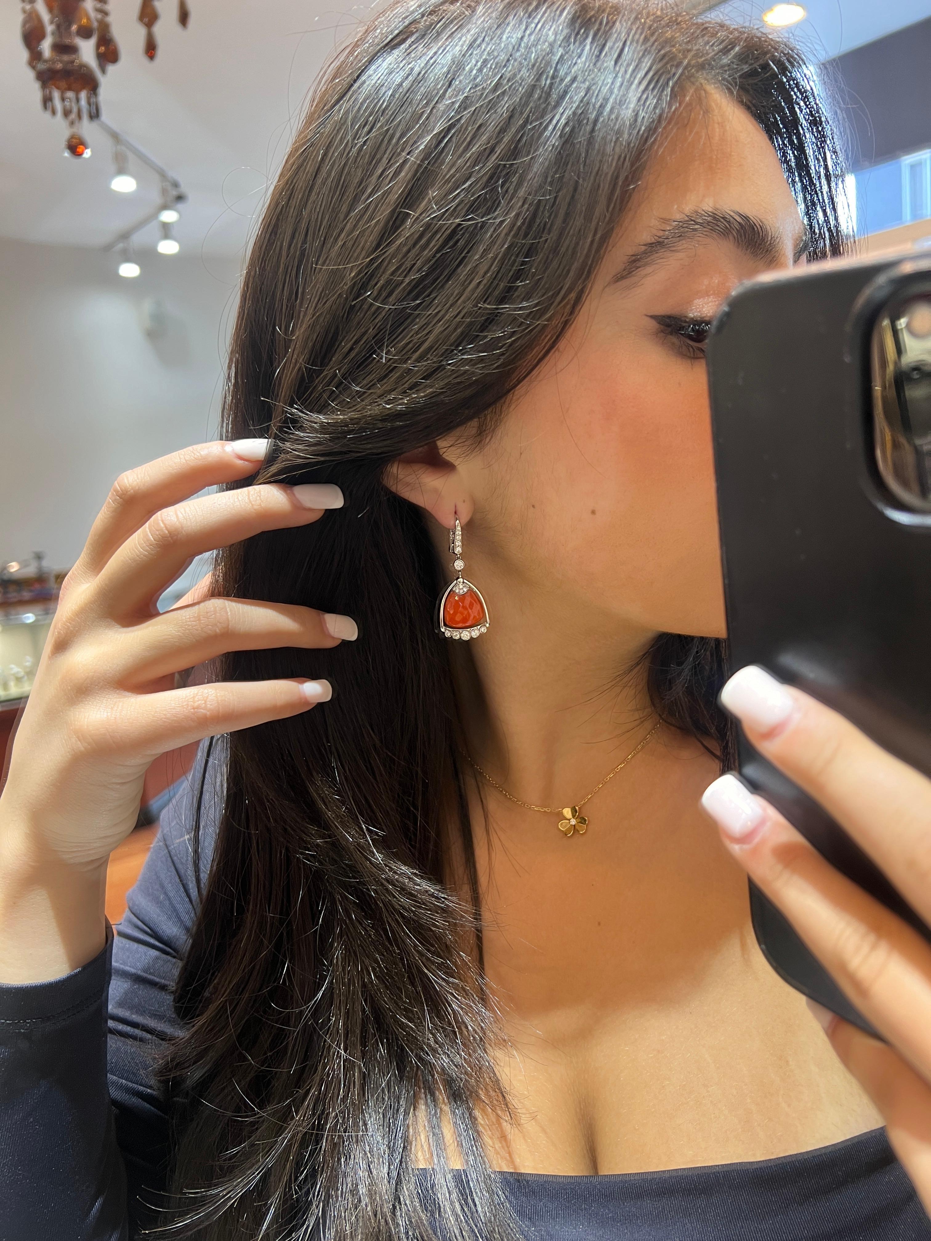 Signed Angeletti Roma, Rare Salmon Coral and Diamond Earring 18k White Gold (750 hallmark), A beautiful solid white gold earring that's very fluid and has a slight dangle. Attached in the center of the earring is a pair of beautiful Salmon Coral