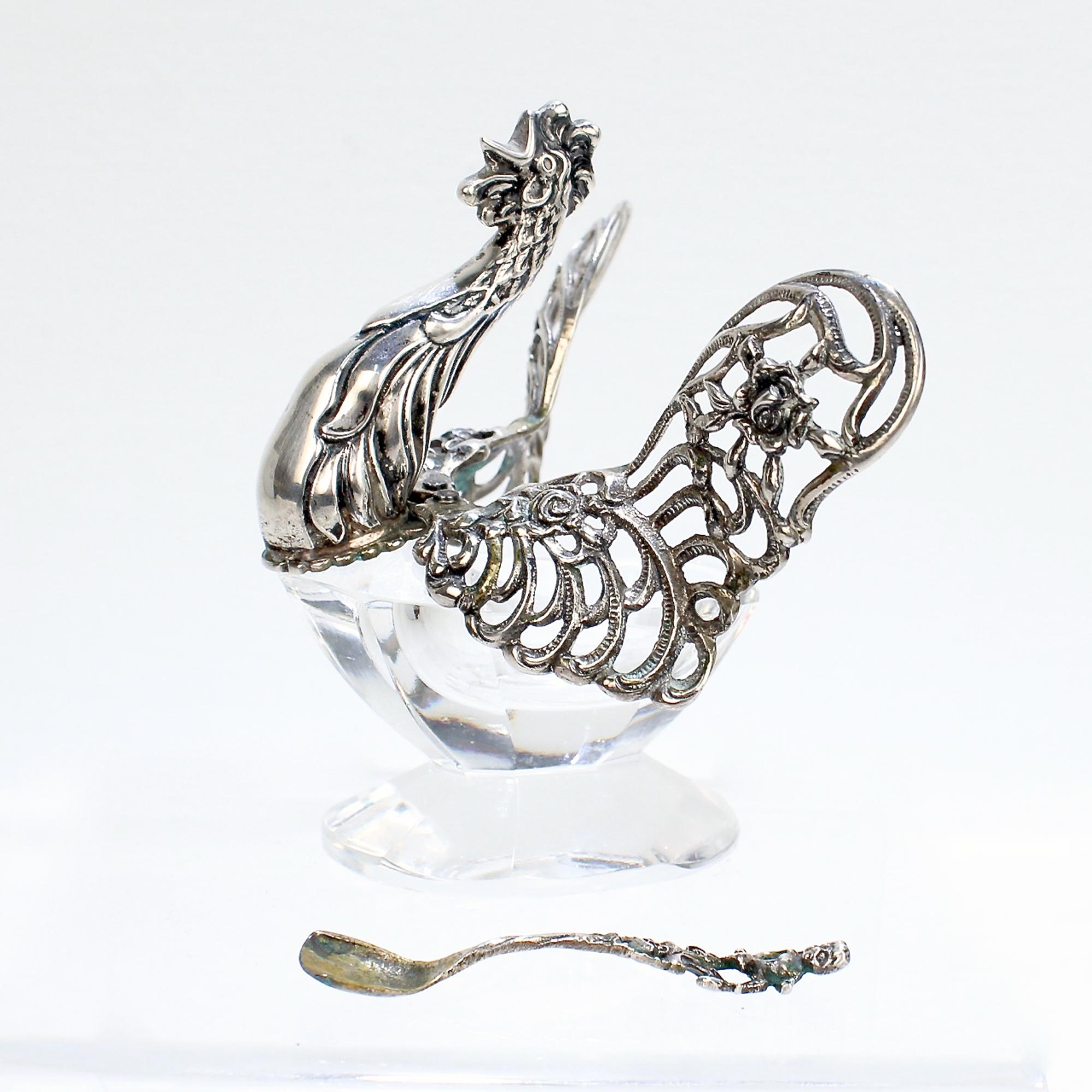 An antique silver & crystal figural rooster salt cellar

In .835 silver.

By August Betz.

Simply a wonderful salt cellar!

Date:
Early 20th Century

Overall Condition:
It is in overall good, as-pictured, used estate condition with some very fine &