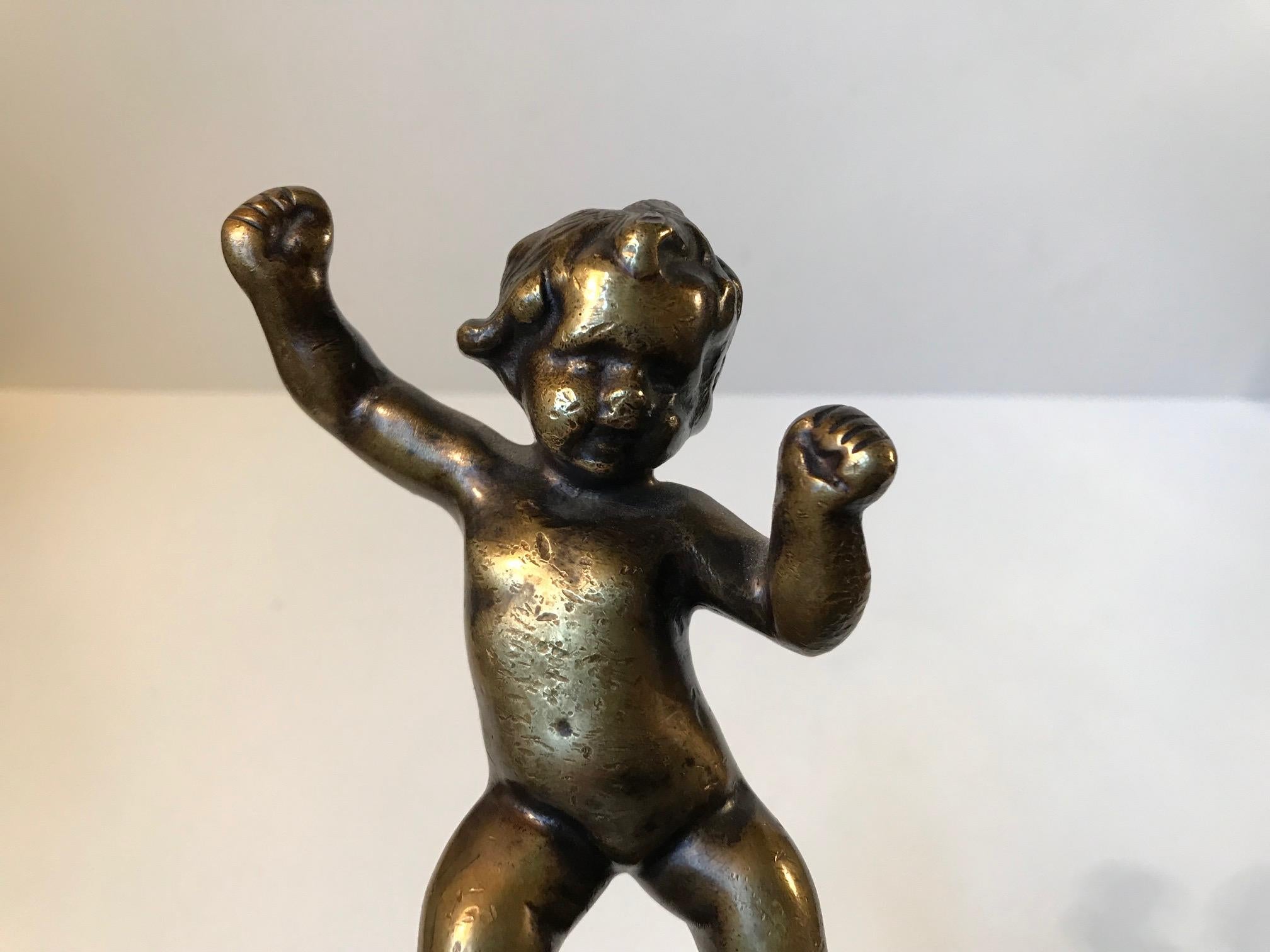 This small bronze is full of movement and delicate expressions. Its signed M.M to the base. These initials has not been identified. The rich patina and style however indicates a manufacturing date circa 1900. Its probably made in either Denmark,