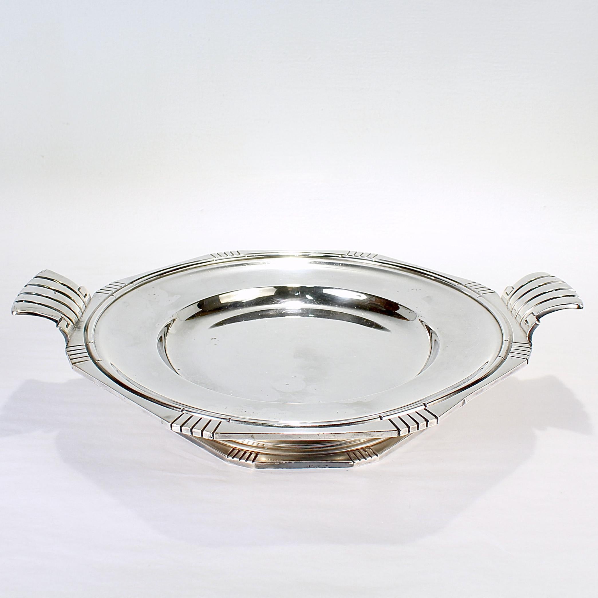 A fine signed French Art Deco period tazza.

In silver plate.

Apparently marked for Durousseau & Reynaud of Lyon, France.

Simply a fine French Art Deco form!

Date:
Early 20th Century

Overall Condition:
It is in overall fair, as-pictured, used