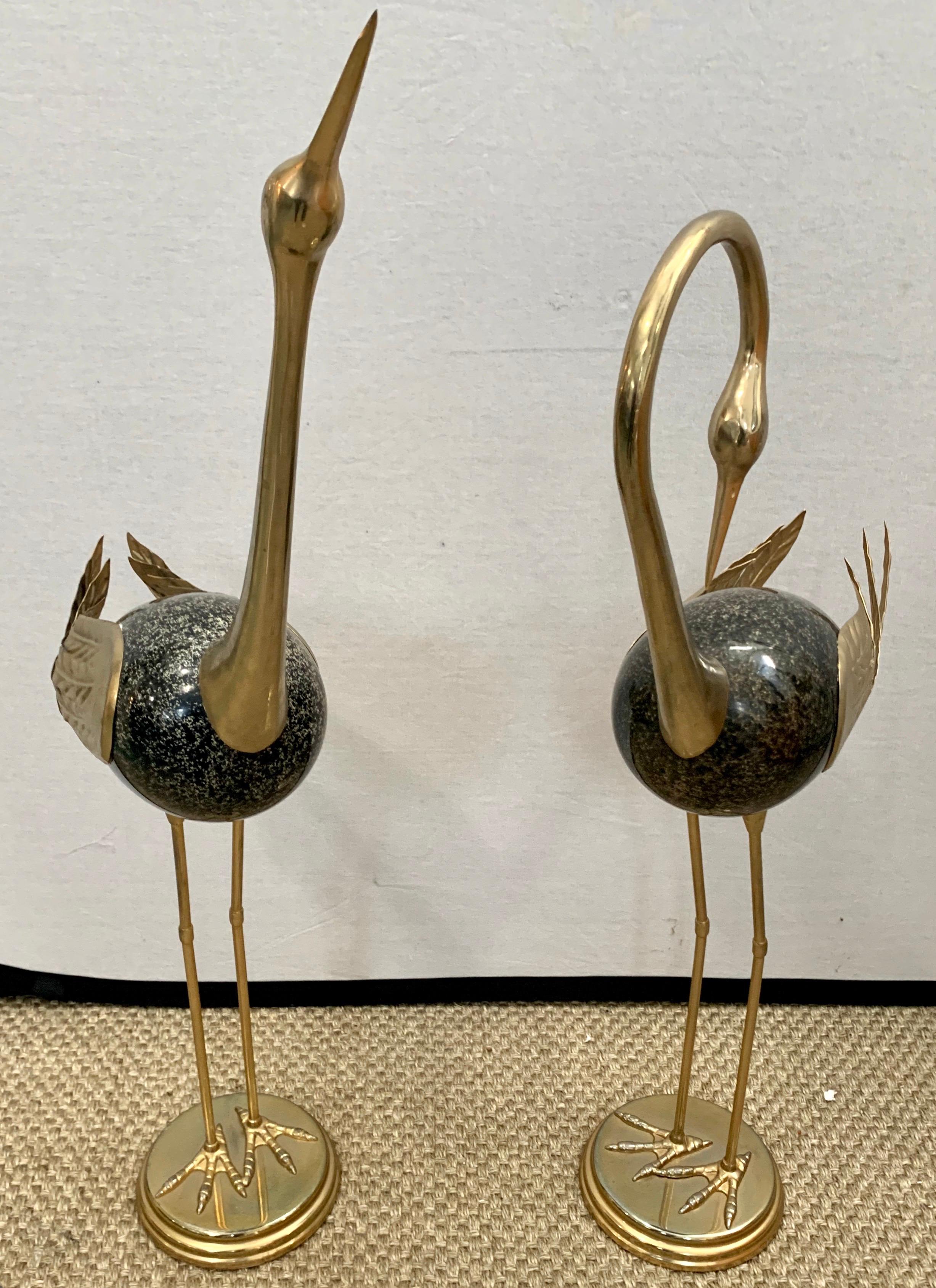 Signed pair of Antonio Pavia gold and black enamel brass bird or egret sculptures. Nothing short of stunning. Made in Italy.