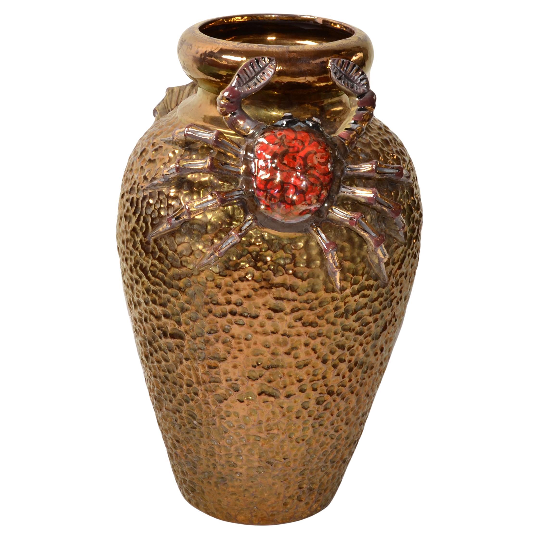 Italian Majolica Style handcrafted, and hand painted Gold hammered Ceramic Vase with a Crab Figurine on 2 Sides.
Nautical Pottery from Italy for large Flowers or Object D' Arte as Floor Vase.  
The outside and inside is glazed.
Stamped, Artistica,
