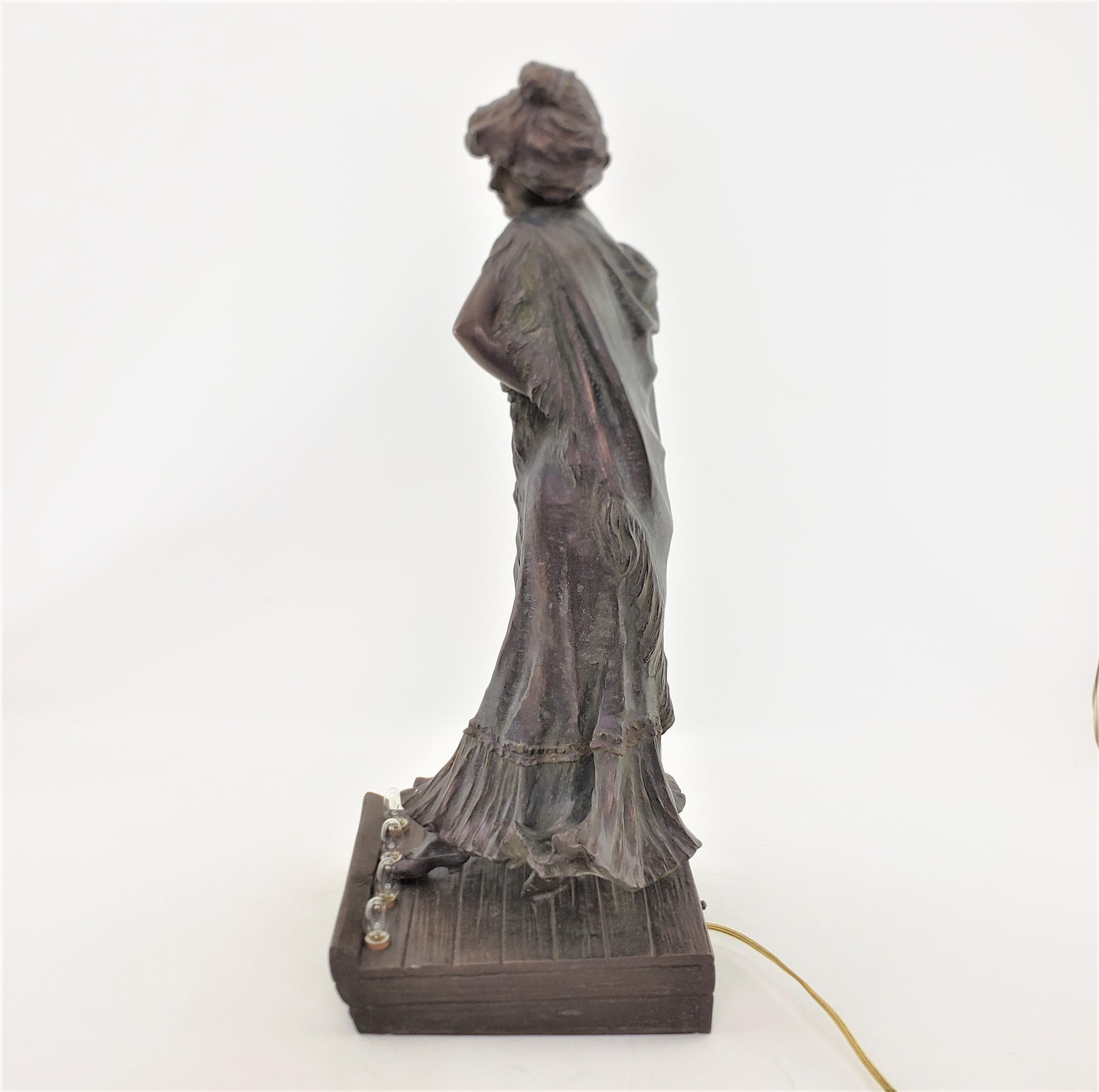 Art nouveau-Stil patinierte, beleuchtete Skulptur von Loie Fuller oder Lampe aus Zinn, signiert im Angebot 6