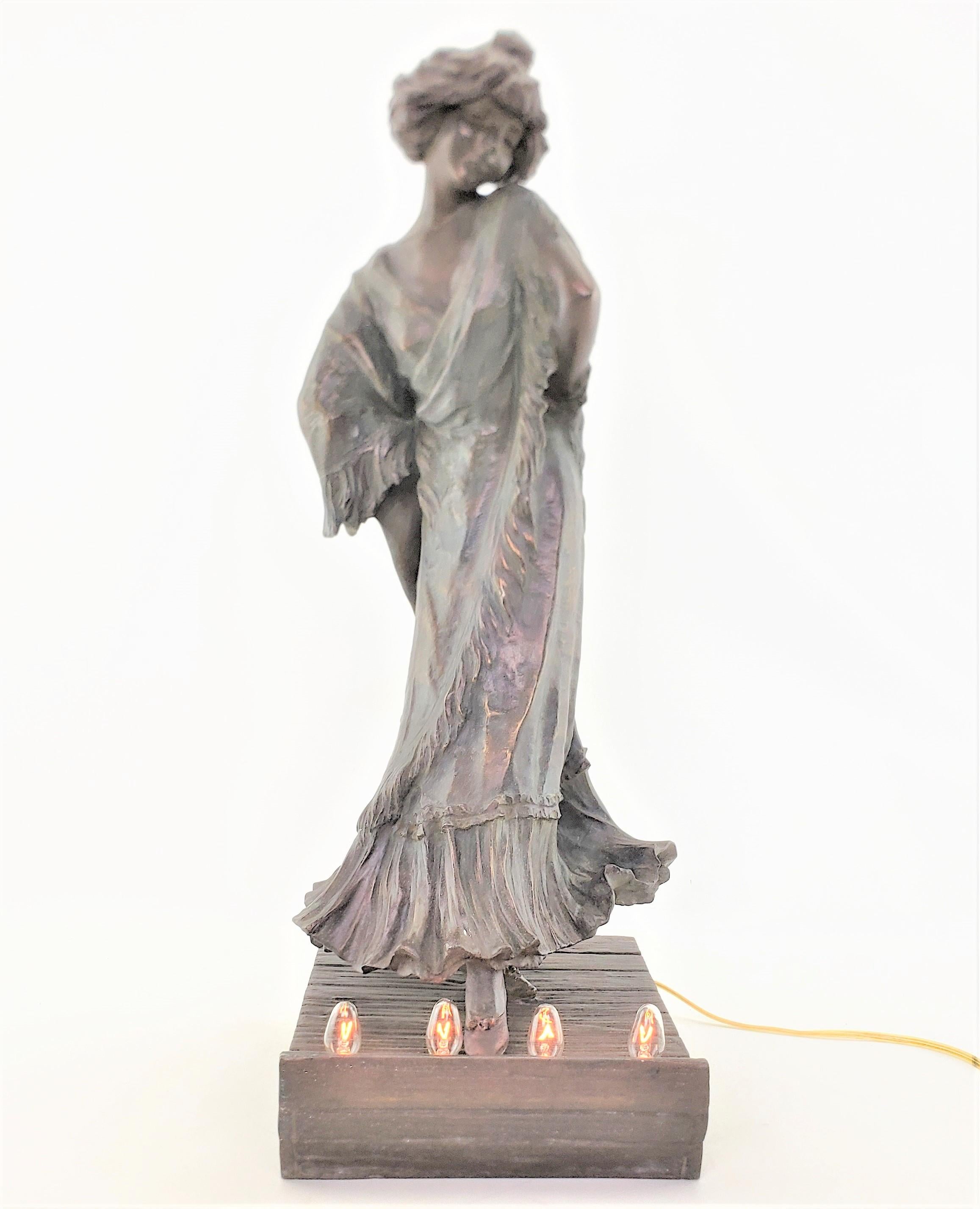 Art nouveau-Stil patinierte, beleuchtete Skulptur von Loie Fuller oder Lampe aus Zinn, signiert im Angebot 13