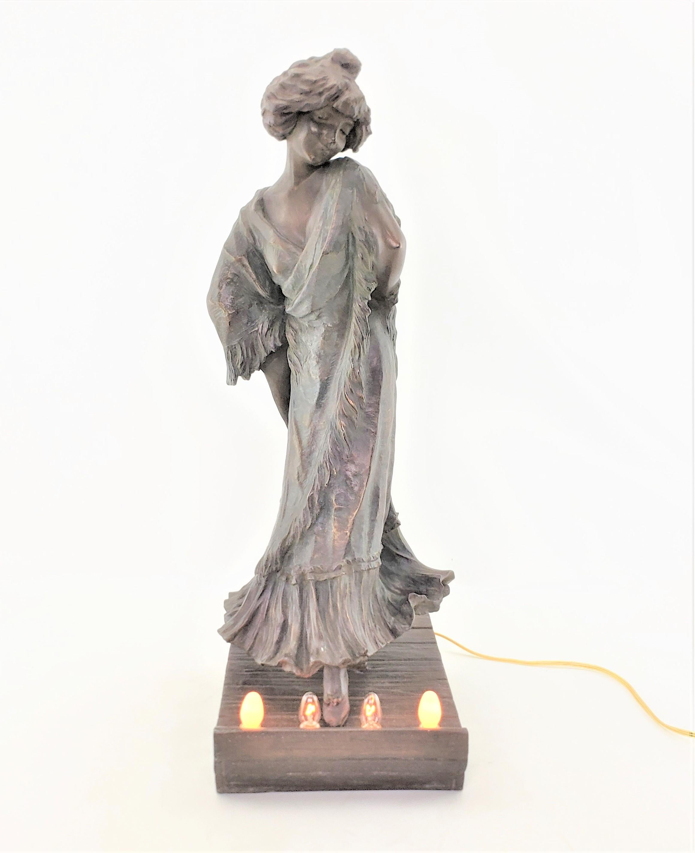 French Signed Art Nouveau Patinated Spelter Lighted Sculpture of Loie Fuller or Lamp For Sale