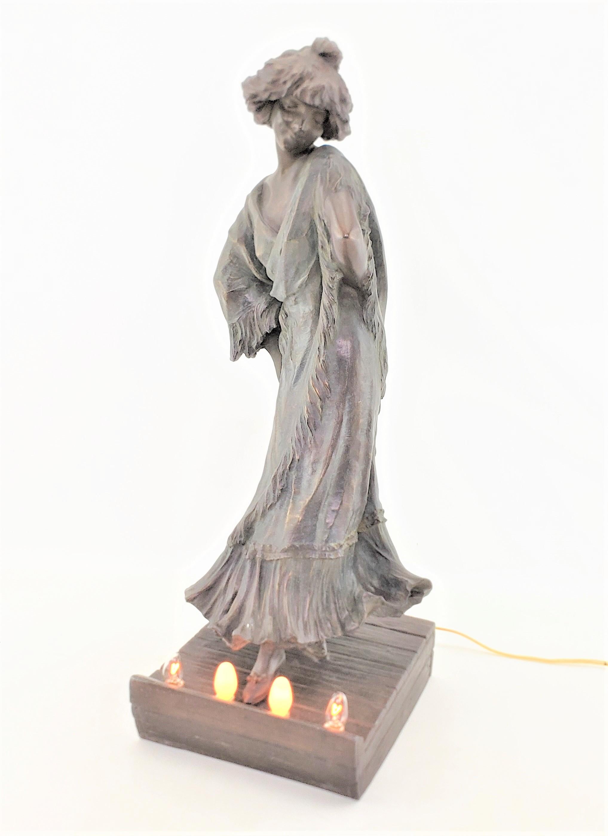 Cast Signed Art Nouveau Patinated Spelter Lighted Sculpture of Loie Fuller or Lamp For Sale