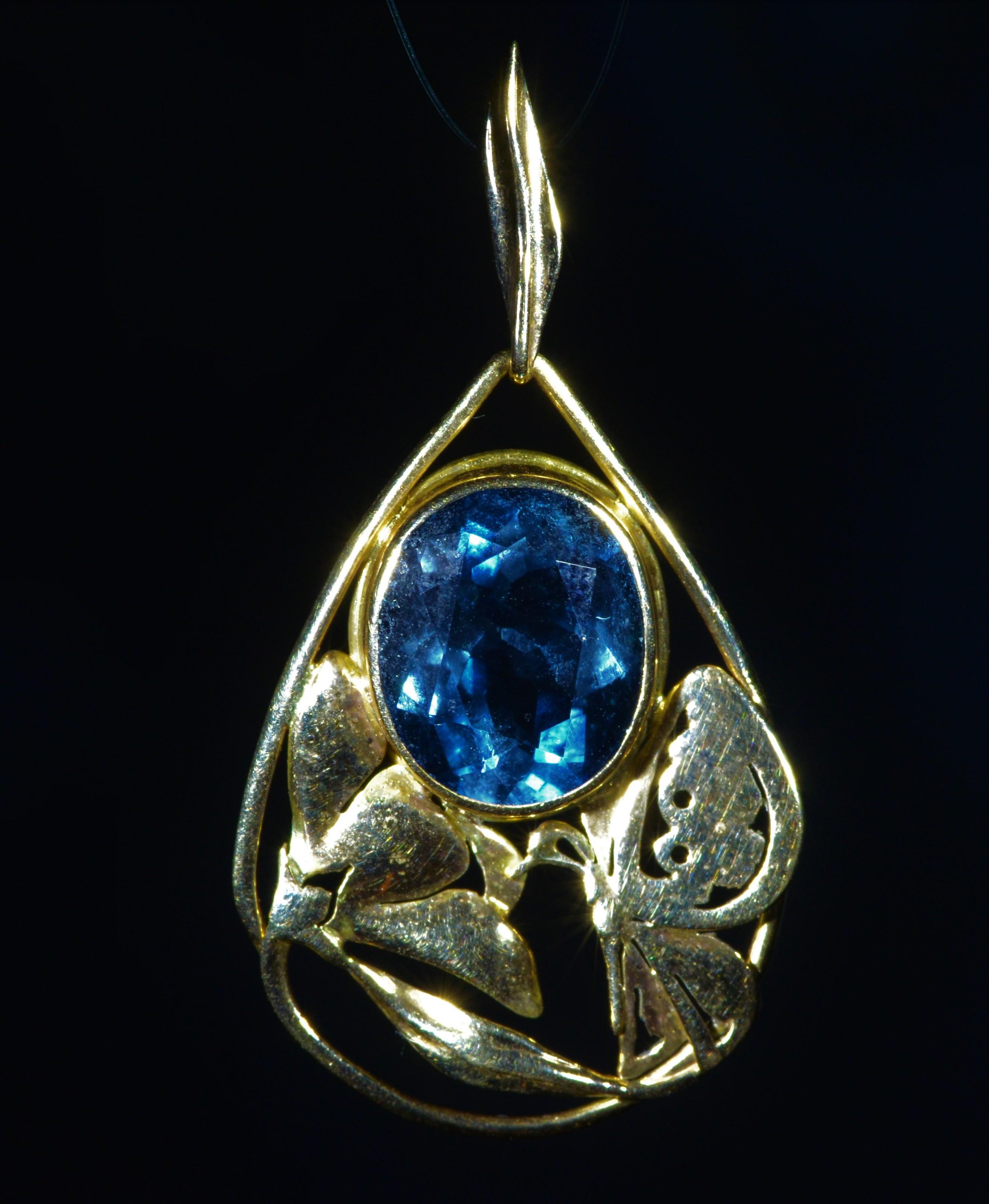 Oval Cut Signed Arts & Crafts Period Blue Topaz Pendant in 14 Karat Yellow Gold For Sale