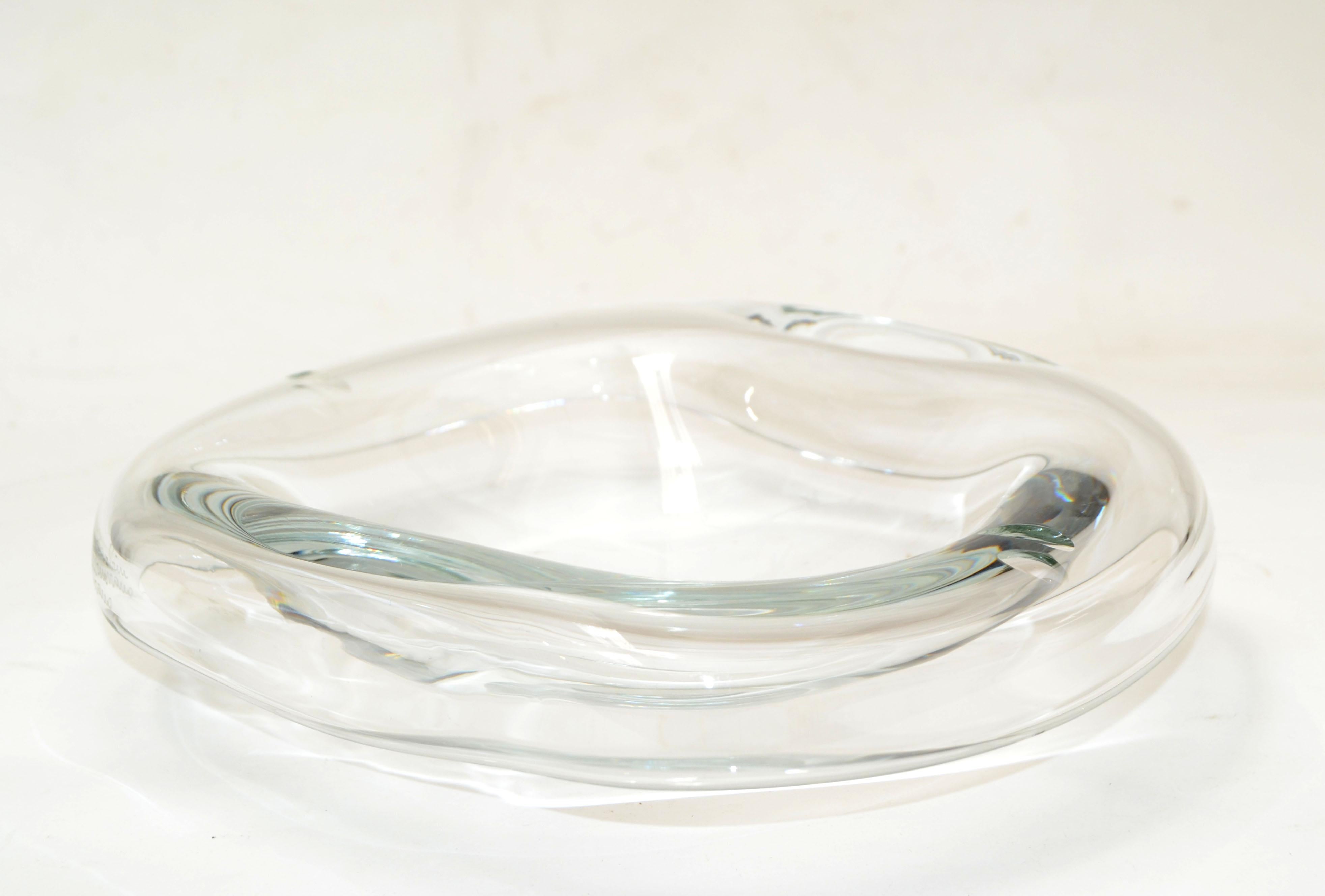 One of a kind decorative Mid-Century Modern Bowl made out of blown clear Murano Art Glass by Barbini, Italy.
A gorgeous addition for your Family table settings.

 